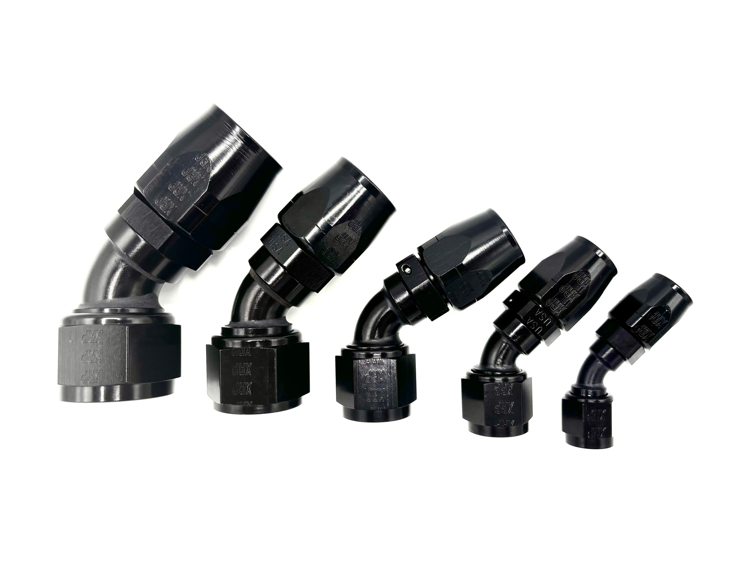 Five 45 Deg. Swivel Hose End to AN Female fittings black. The bends are going towards the right. They are arranged in a line from largest to smallest.