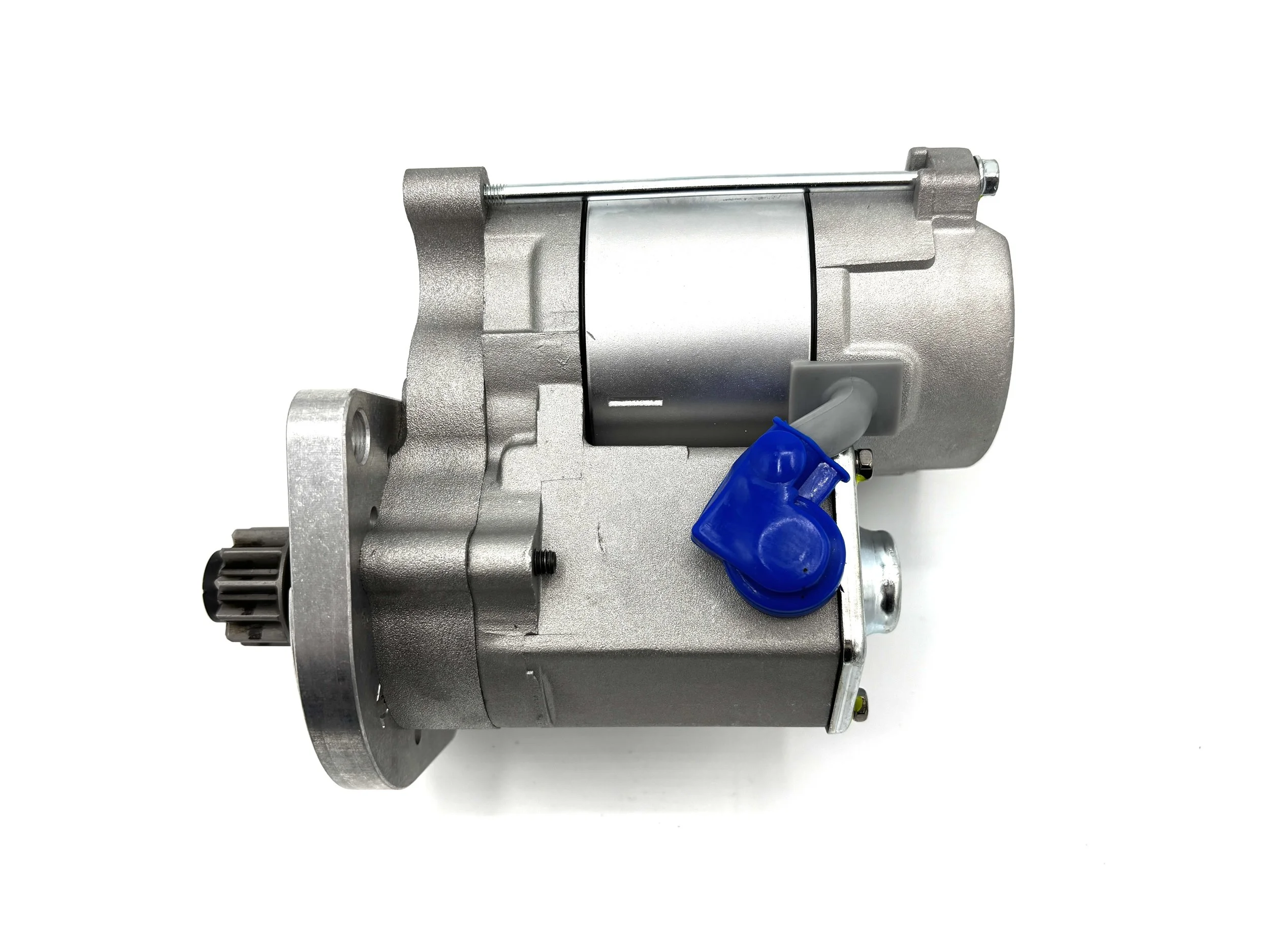 WOSP High Torque Gear Reduction VW Starter. Gray in color. Has small gear on the front. Has Blue wire post boot. Has motor on top.