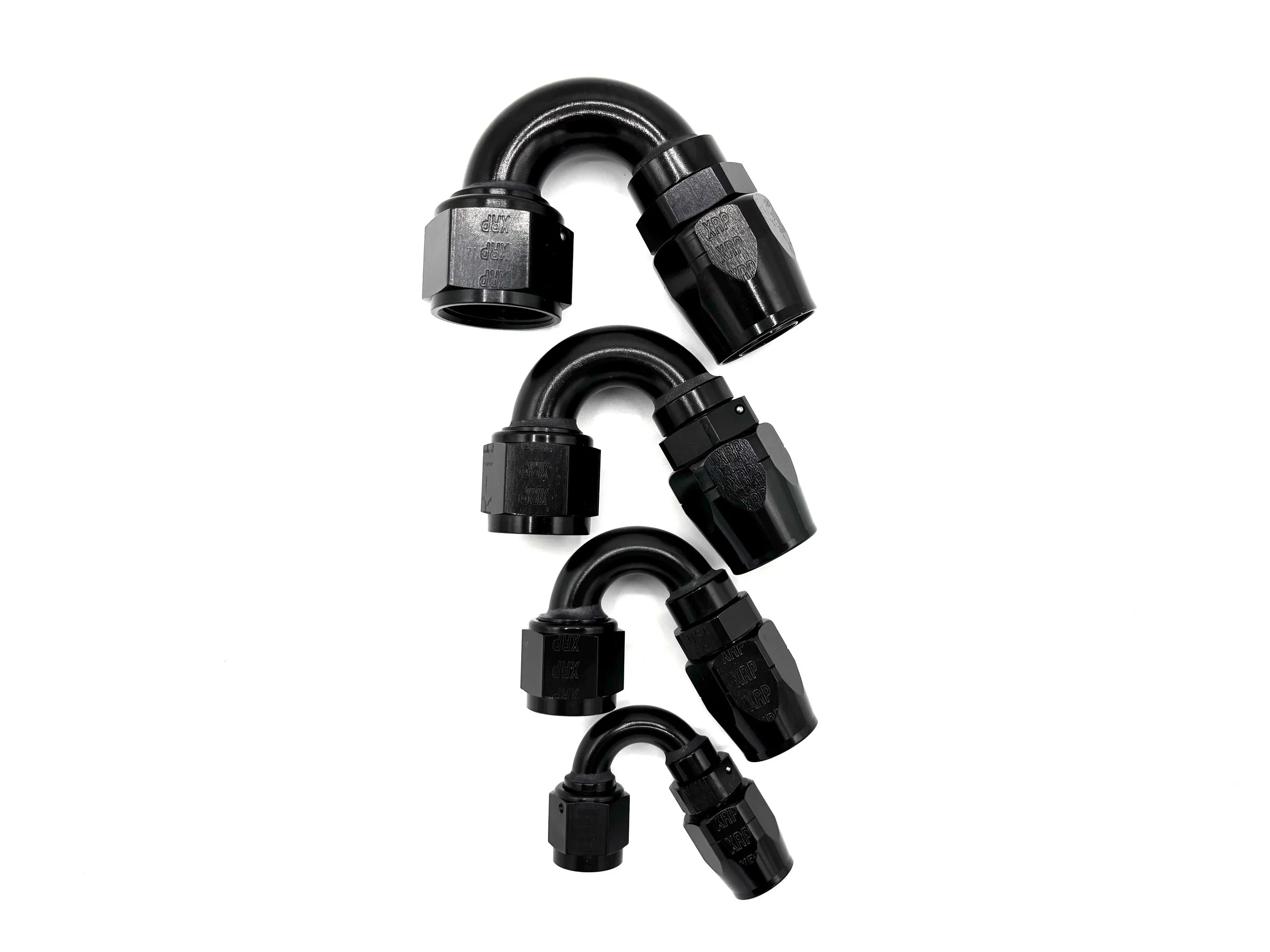 Four 150 Deg. Swivel Hose End to AN Female fittings black. The bends are going towards the right. They are arranged in a line from largest to smallest.