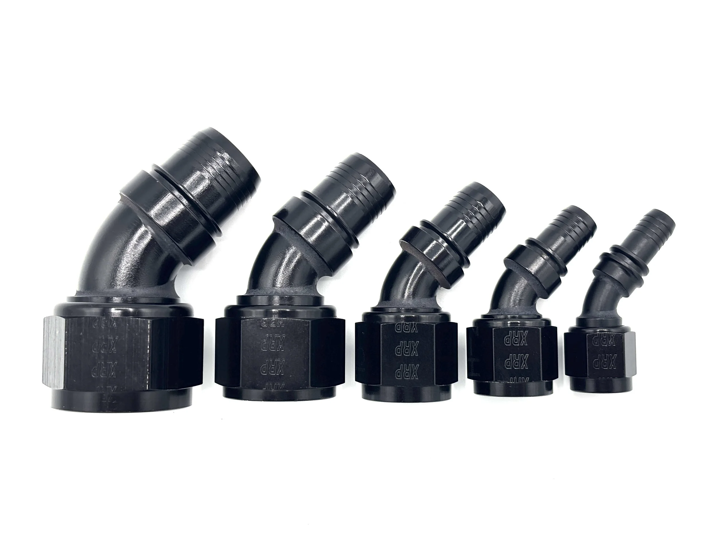 XRP 45 deg. race crimp hose end to AN female. Black in color. Various sizes from largest to smallest, left to right.
