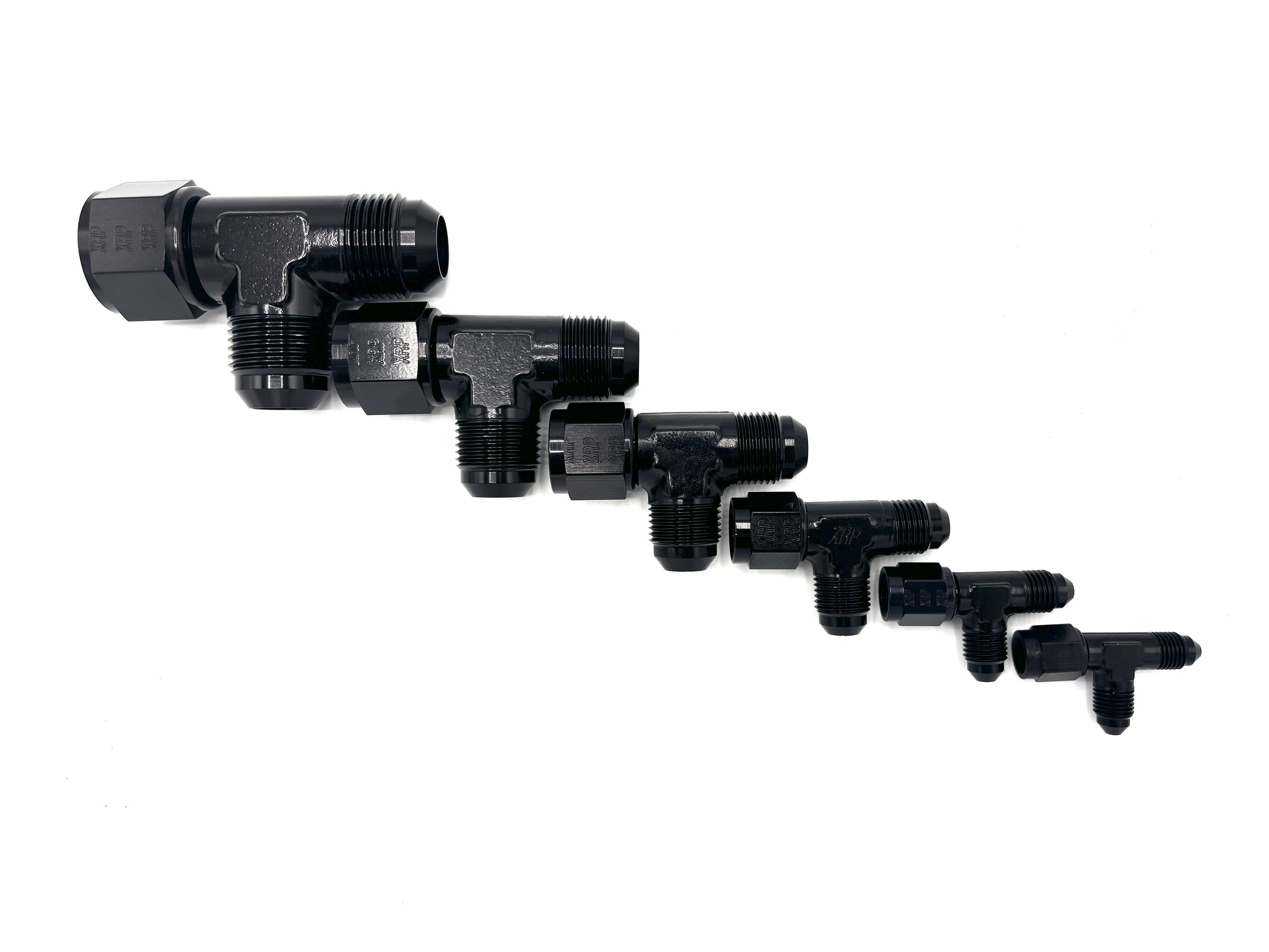 AN male with AN female swivel on run fitting. AN female is inline with the AN male on the straight of the tee. Black in color. Various sizes in a line, largest to smallest, left to right.