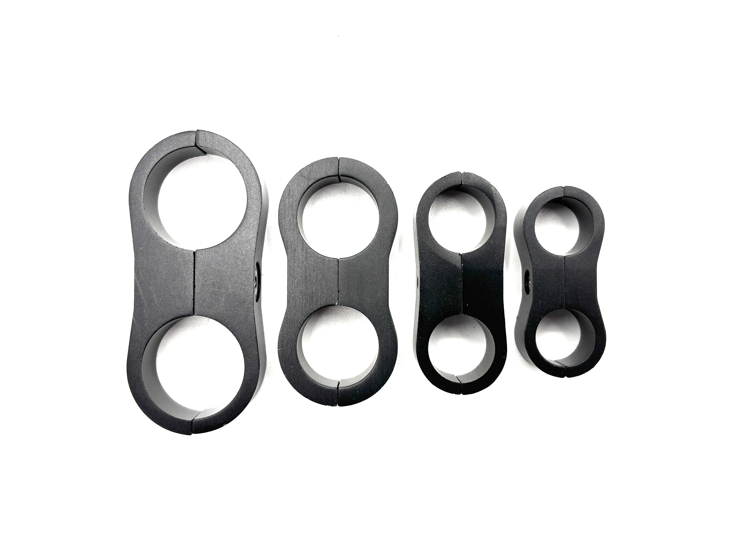 Setrab billet hose separator. Black in color. Black in color.