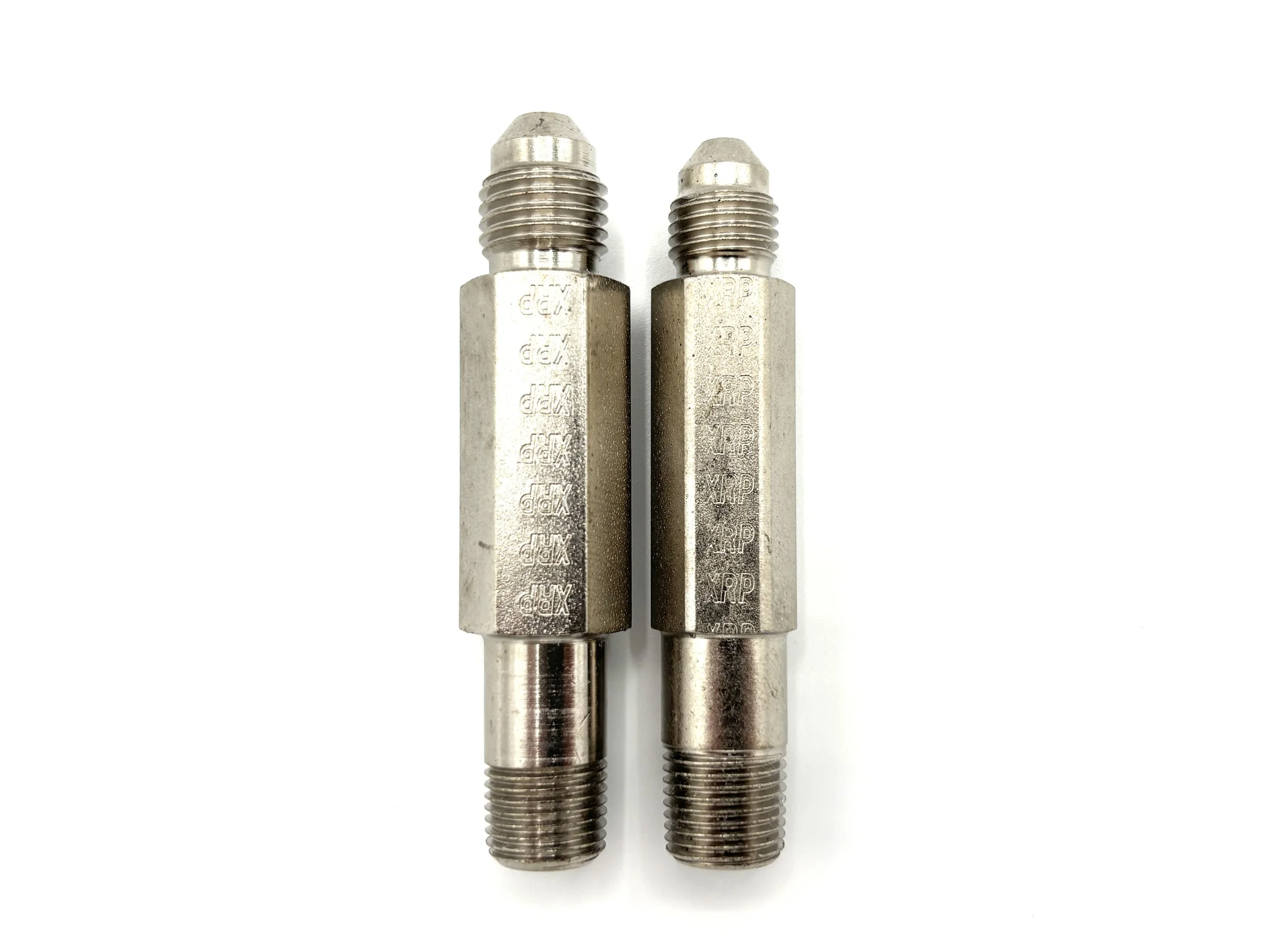 XRP AN male to 1/8NPT male steel XL extended adapter. Silver in color. Various sizes from largest to smallest, left to right.
