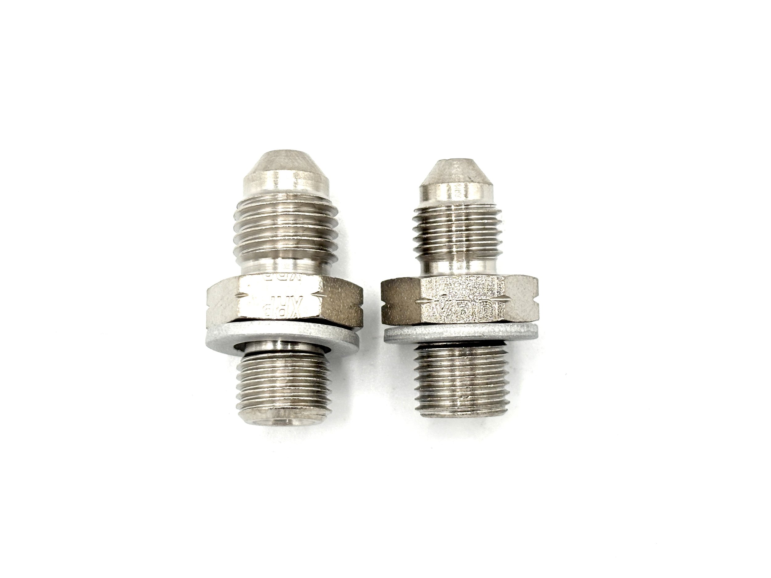 XRP AN male to M10 x 1.0 male steel crush washer seal adapter. Silver in color. Various sizes from largest to smallest, left to right.