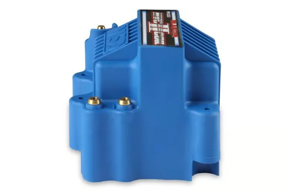 Side of MSD HVC 2 Blaster Series Ignition Coil. Blue in color. Says HVC II Coil on the top written in silver and red. Has gold posts.