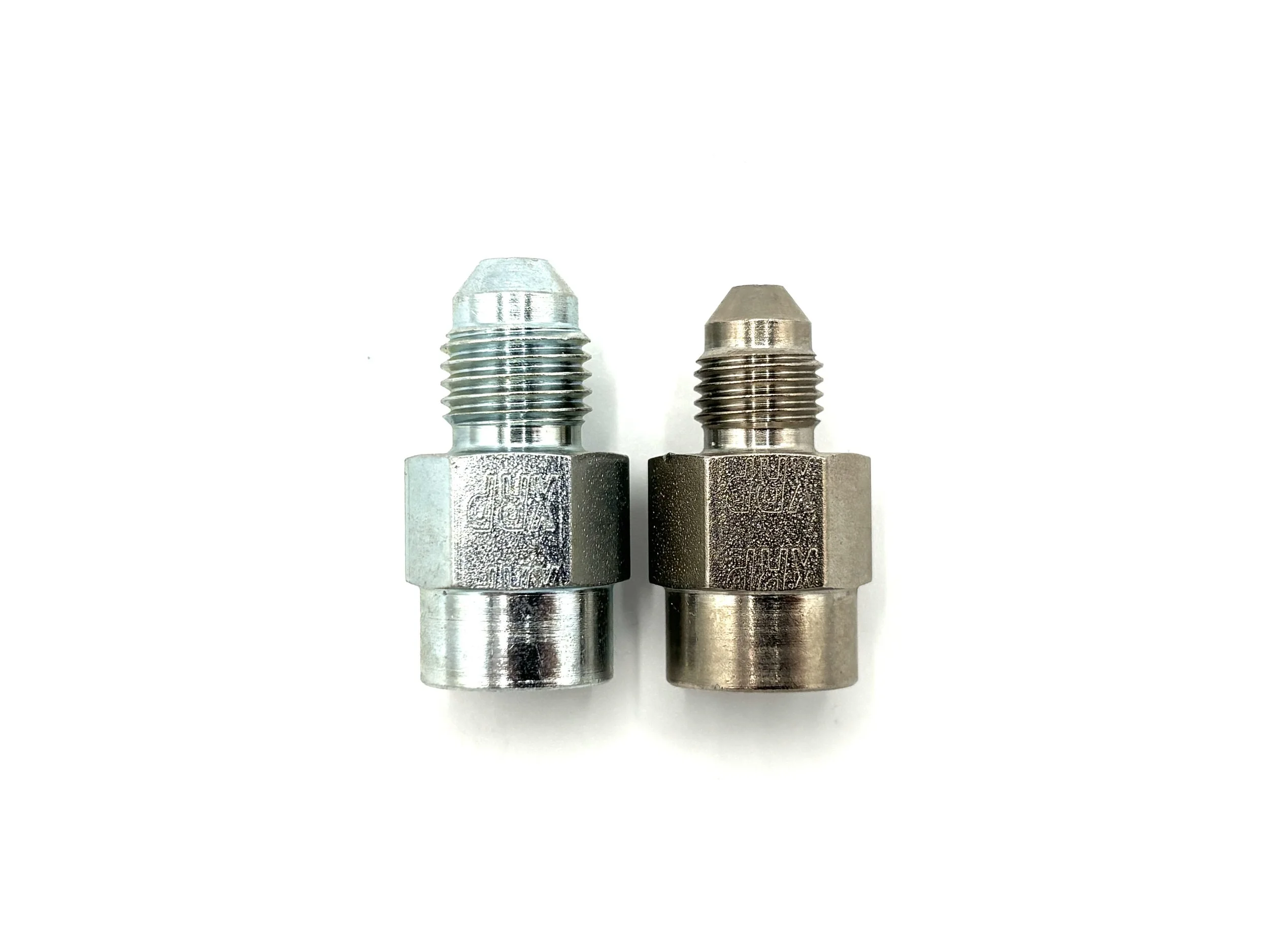 XRP straight AN male to 1/8NPT female steel gauge adapter. Silver in color. Various sizes from largest to smallest, left to right.