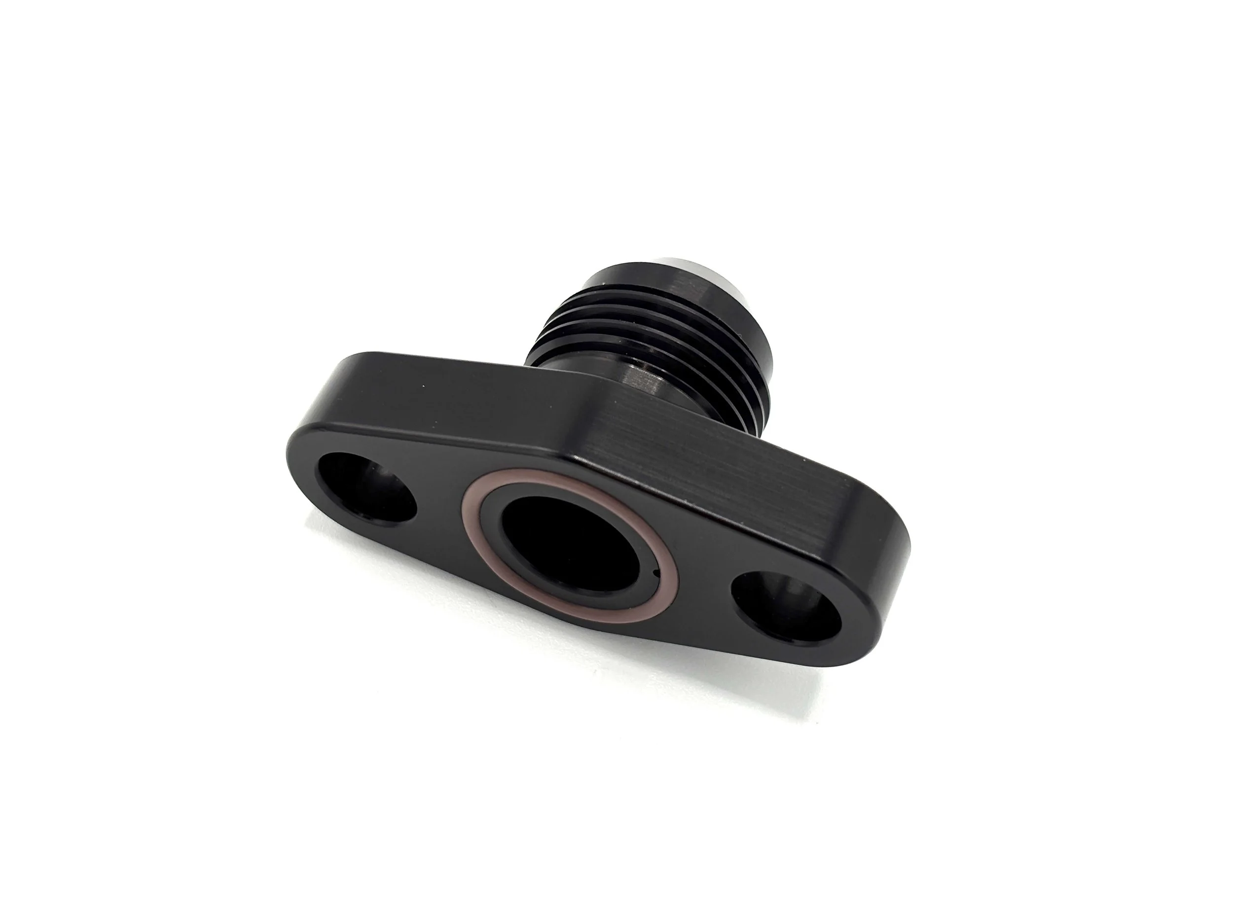 Earl's -10AN male to turbo oil drain flange fitting. Black in color.