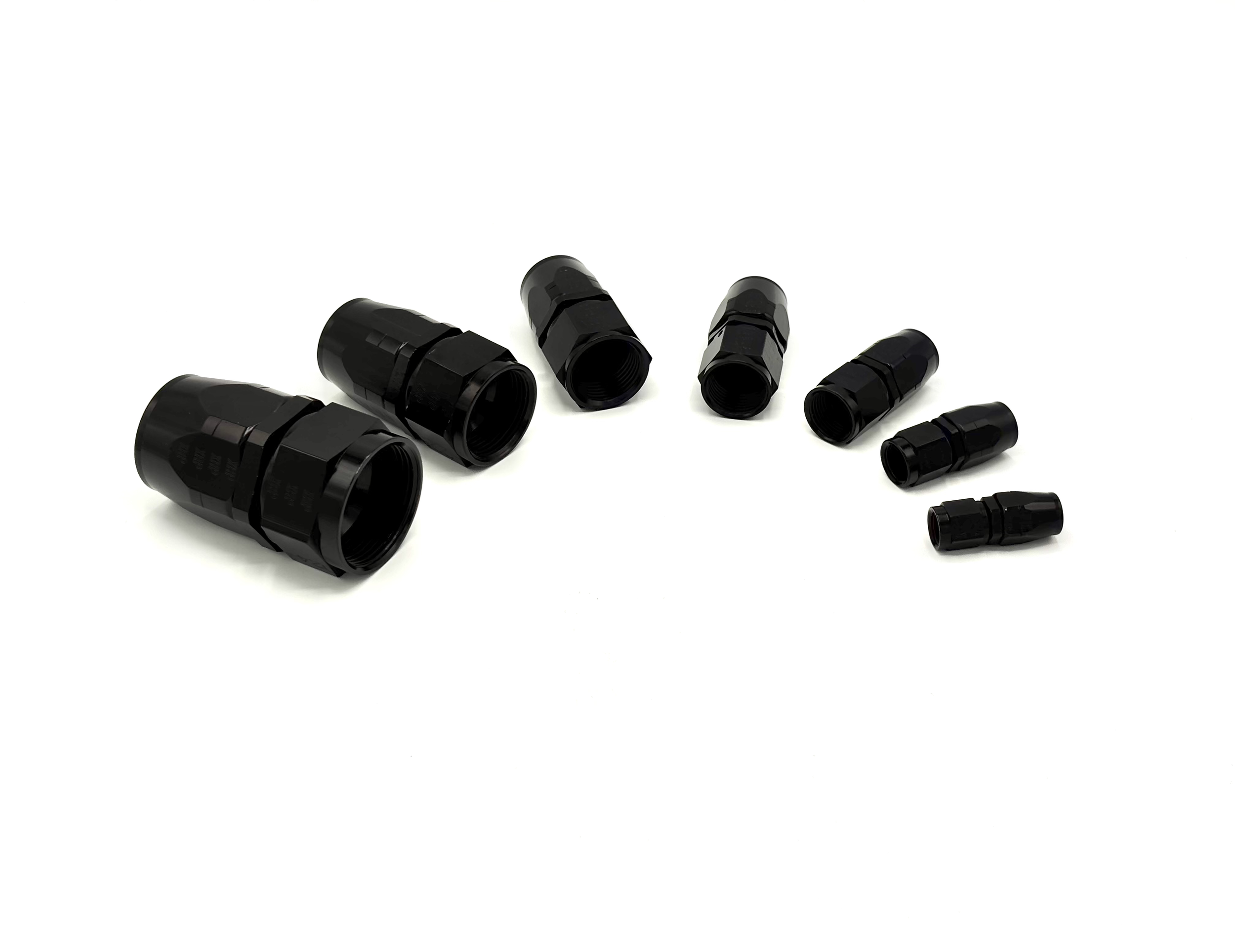 Straight Non-Swivel and Swivel Hose End to AN Female Fittings arranged in a half circle with the hose ends facing towards the middle.