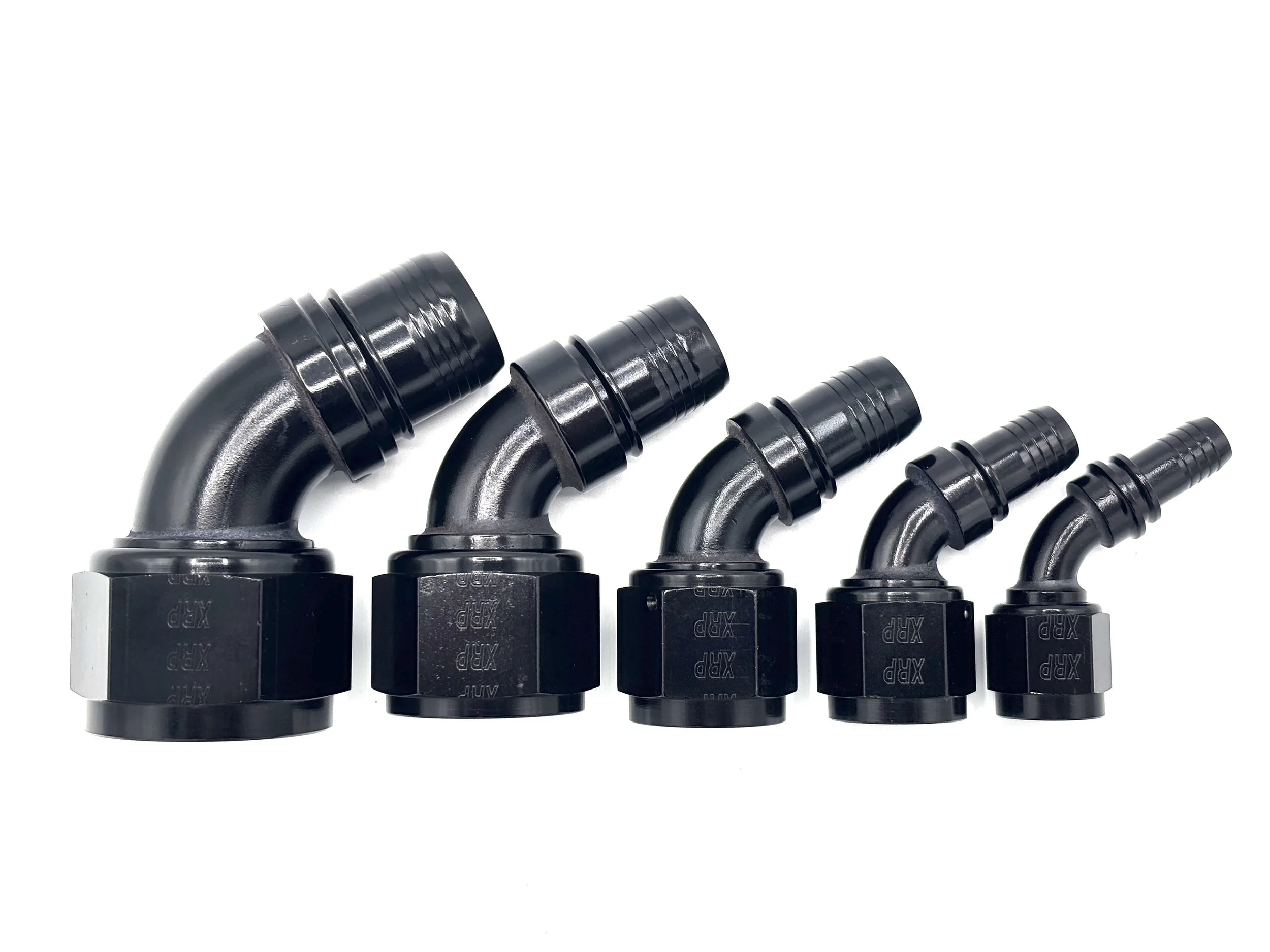 XRP 60 deg. race crimp hose end to AN female. Black in color. Various sizes from largest to smallest, left to right.