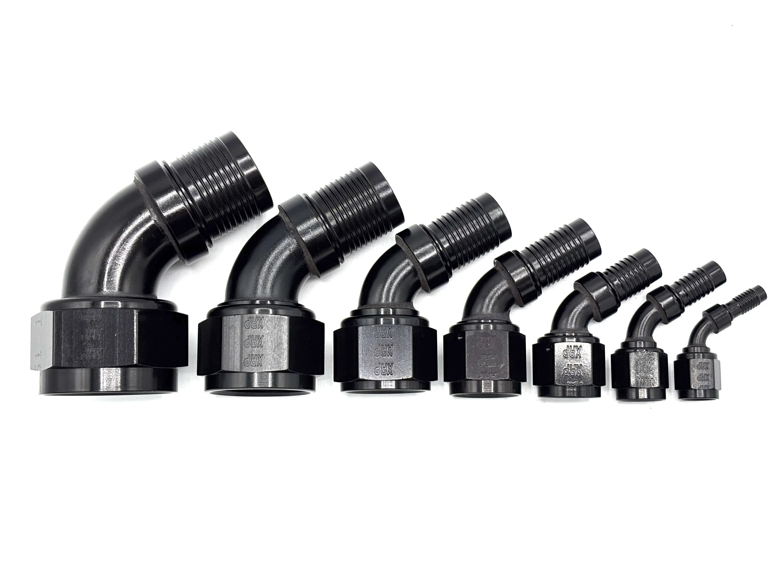 XRP 60 deg. HS-79 crimp hose end to AN female. Black in color. Various sizes from largest to smallest, left to right.
