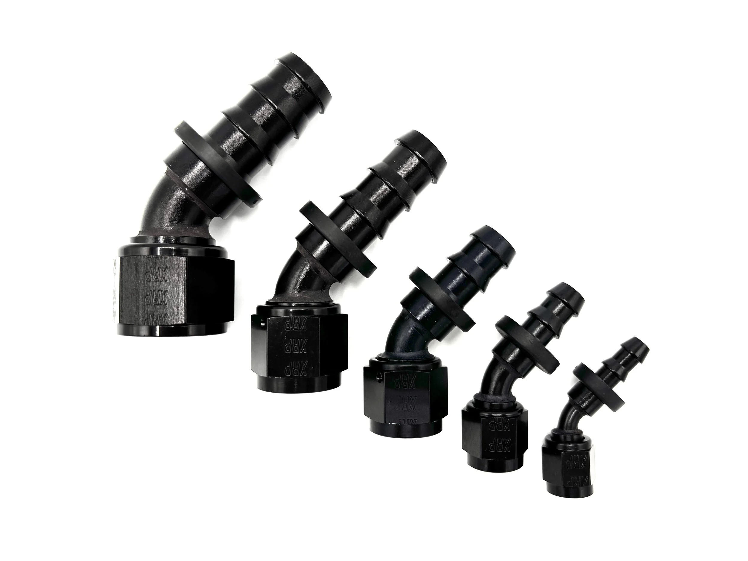Five 45 Deg. Push Lock Hose End to AN Female fittings black. The bends are going towards the right. They are arranged in a line from largest to smallest.