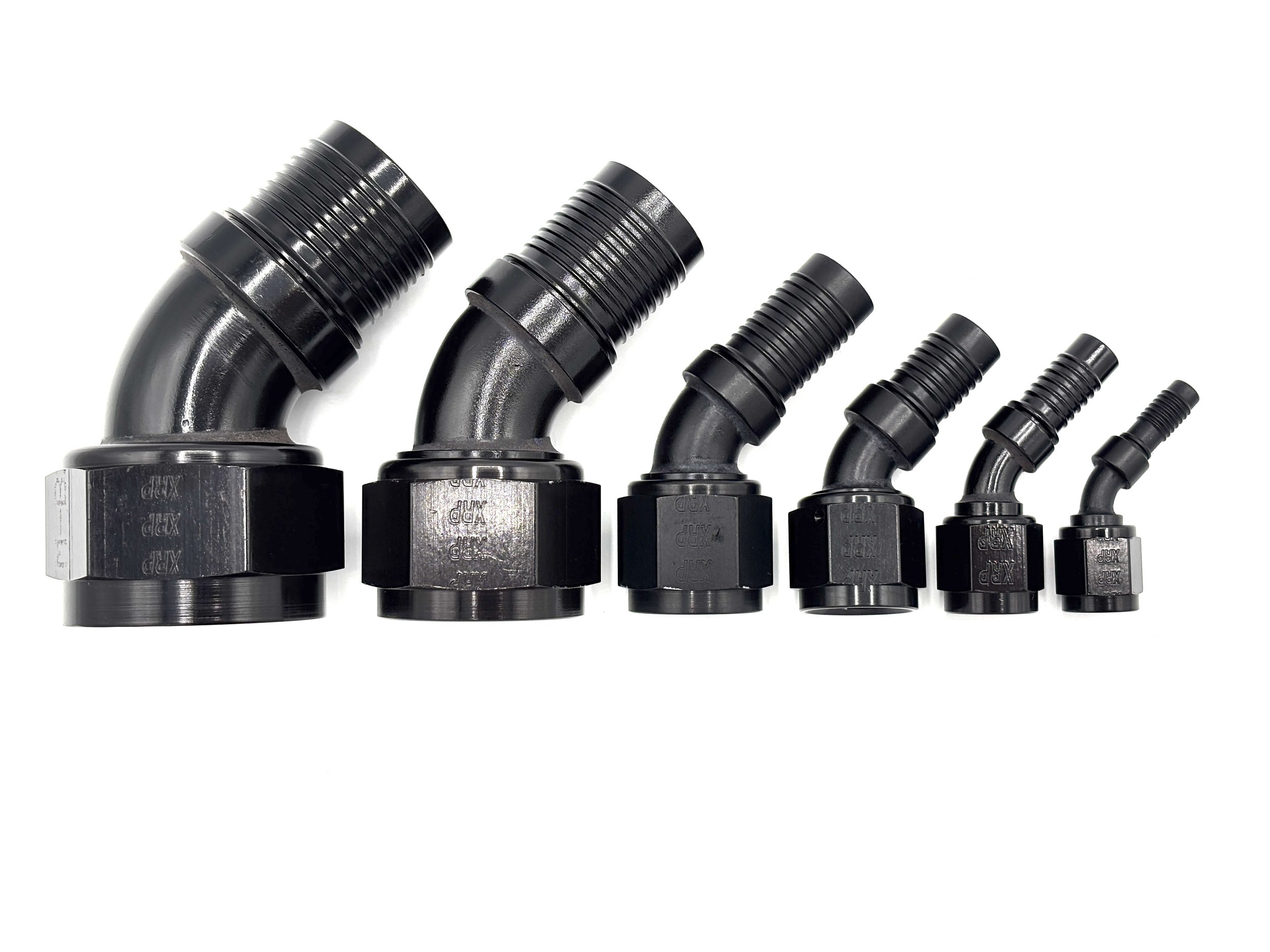 XRP 45 deg. HS-79 crimp hose end to AN female. Black in color. Various sizes from largest to smallest, left to right.