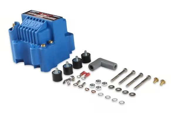 MSD HVC 2 Blaster Series Ignition Coil. Blue in color. Says HVC II Coil on the top written in silver and red. Has gold posts. All included hardware is next to it.