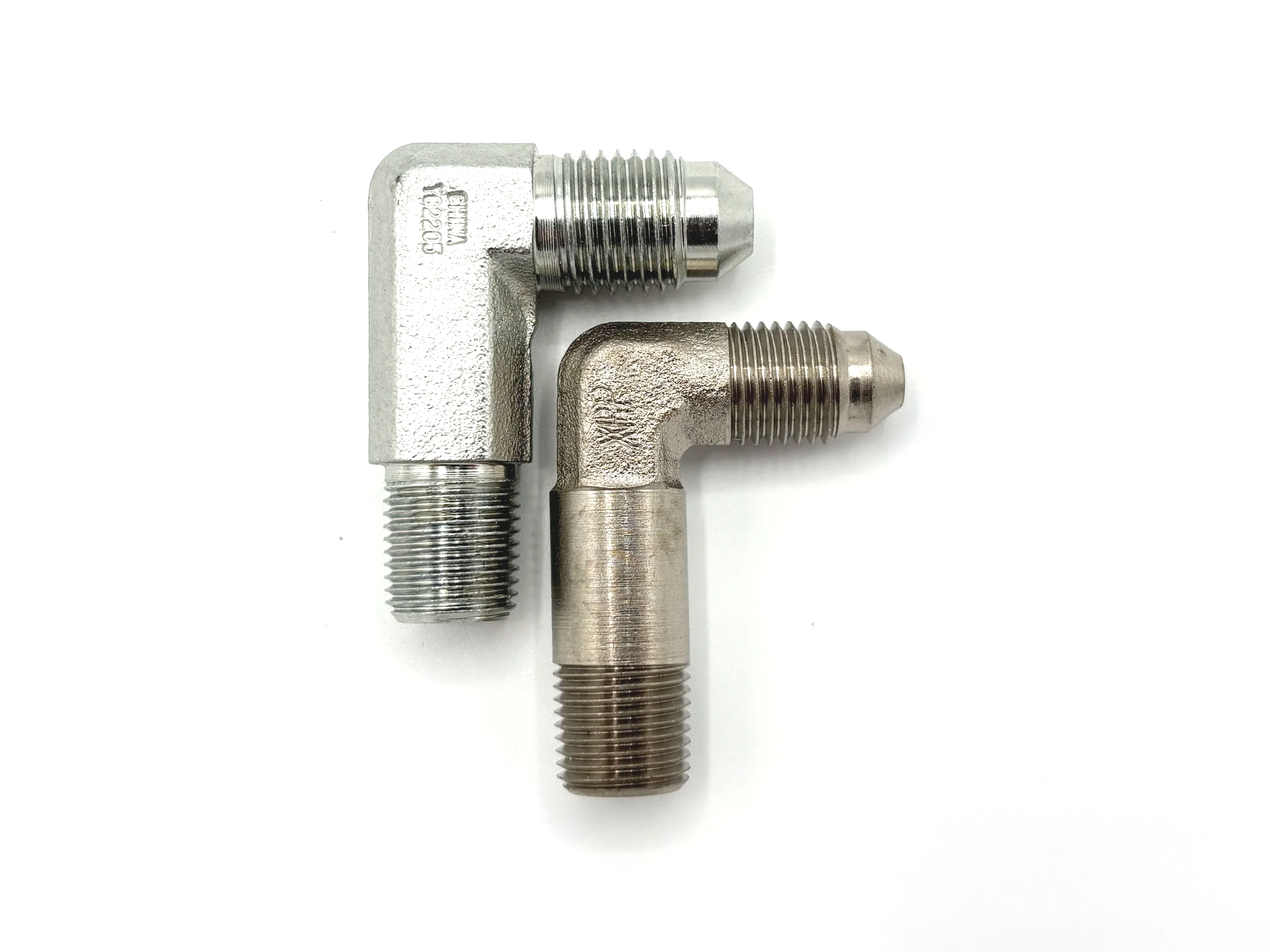 XRP 90 deg. AN male to 1/8NPT male steel extended adapter. Silver in color. Various sizes from largest to smallest, left to right.