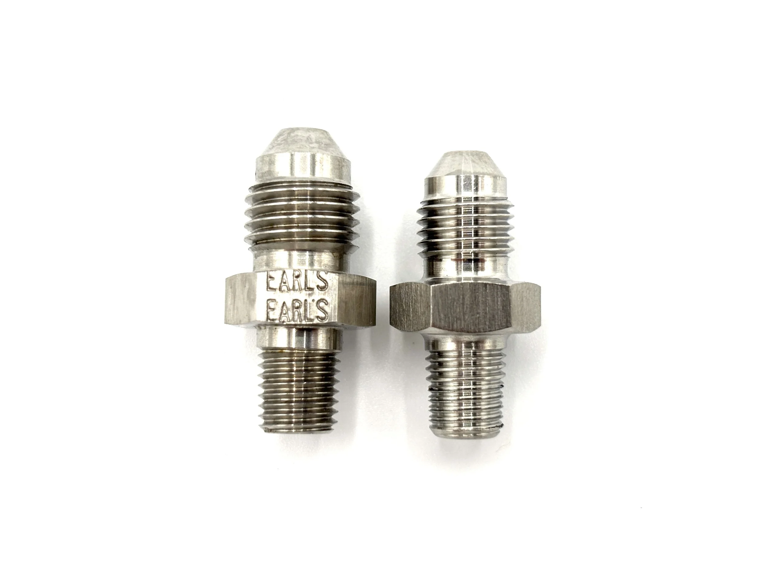 Earl's straight AN male to 1/16NPT male adapter. Silver in color. Various sizes from largest to smallest, left to right.