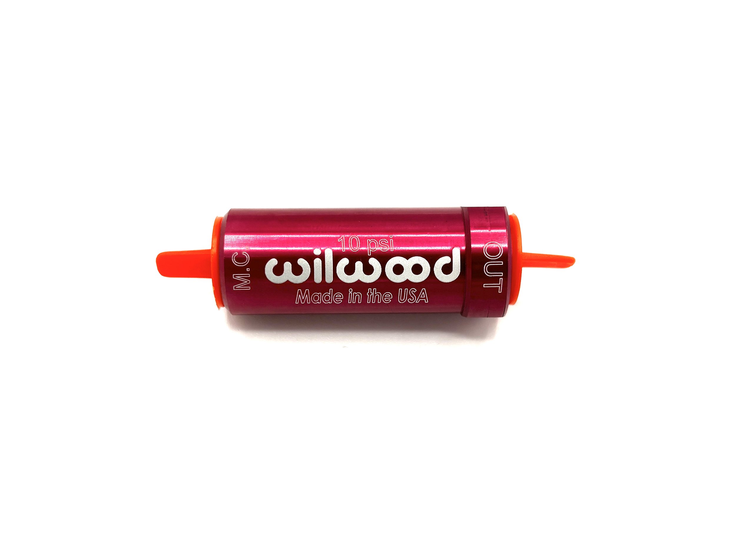 Wilwood Residual Pressure Valve. Red exterior, says Wilwood 10 PSI Made in the USA in white writing. Has Red plugs on either side.
