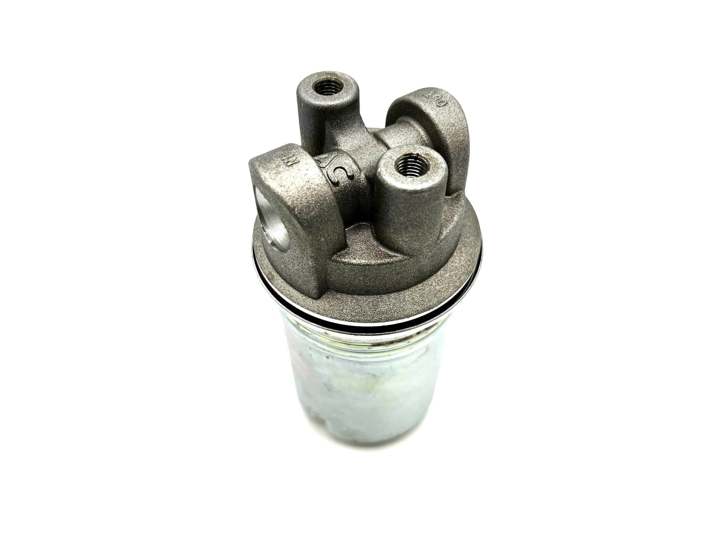 ACDelco Fuel Filter with the canister on. Top view of the fuel filter. Exposed metal look.