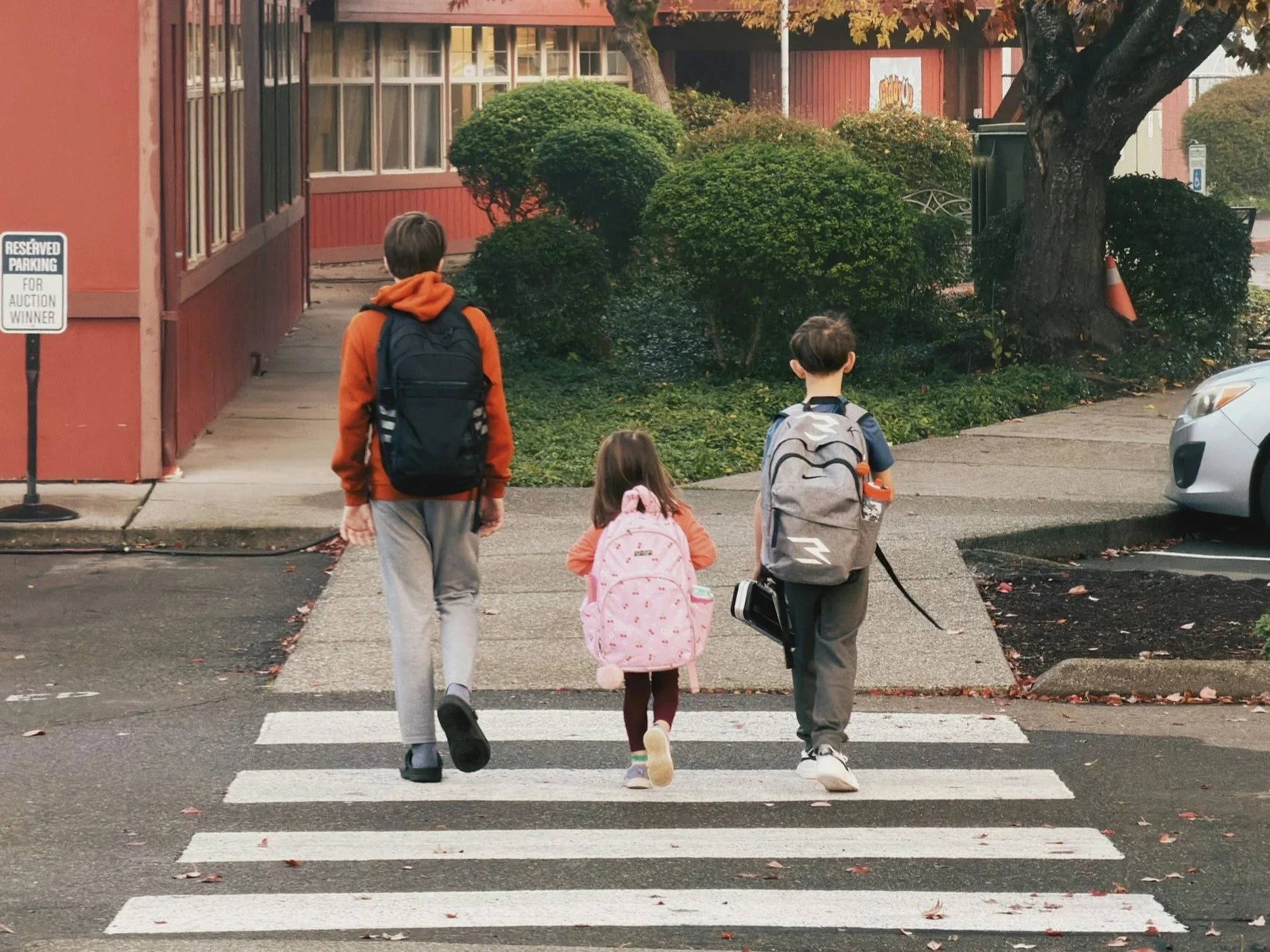 Kids crossing in a crosswalk