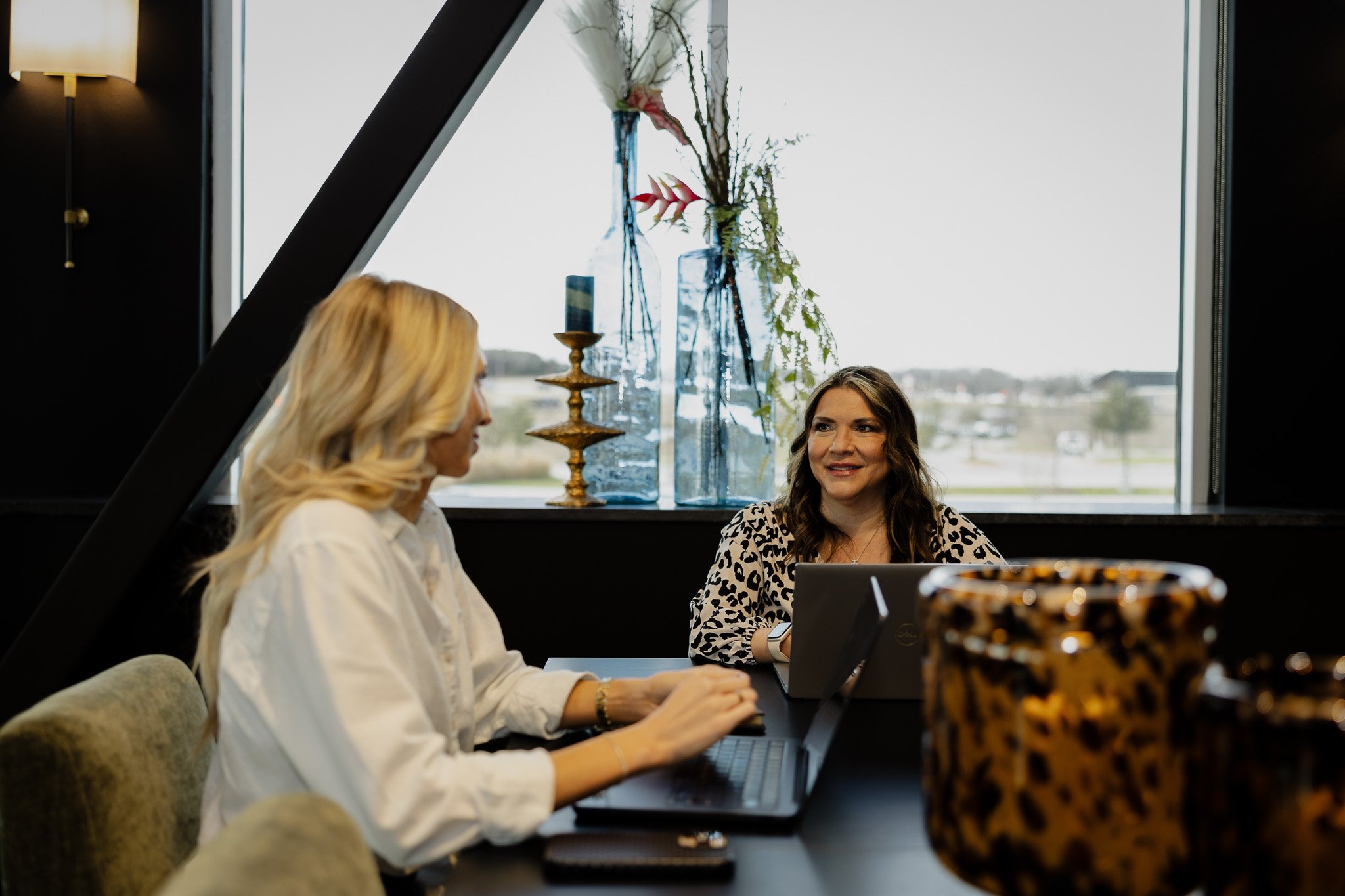 Two women coworking together at Kings Gate in Willow Park, TX