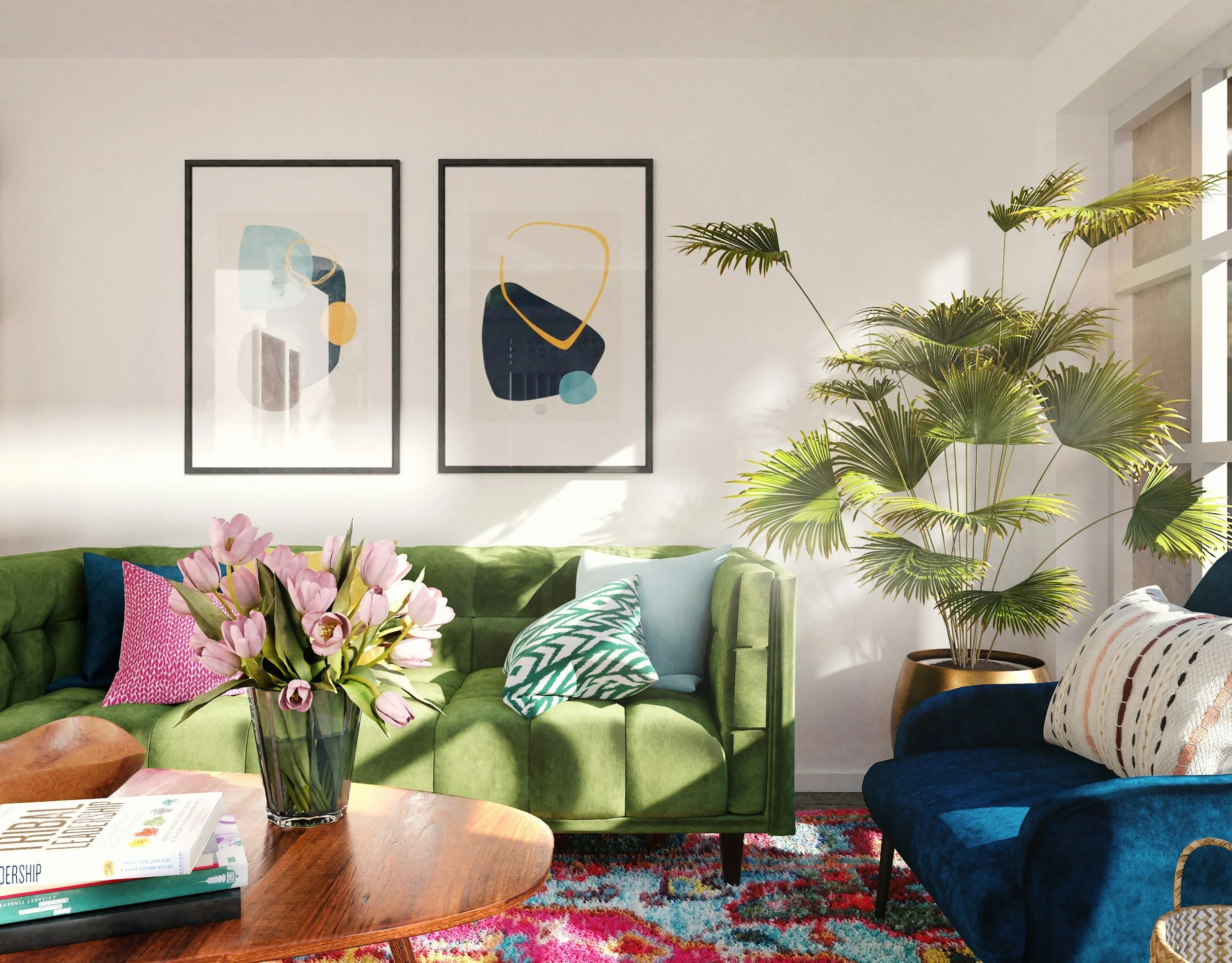 A living room with a green sofa, a blue armchair, colorful pillows, a glass vase with pink flowers on a wooden coffee table, two abstract framed artworks on the wall, a large potted palm, and a multicolored rug.