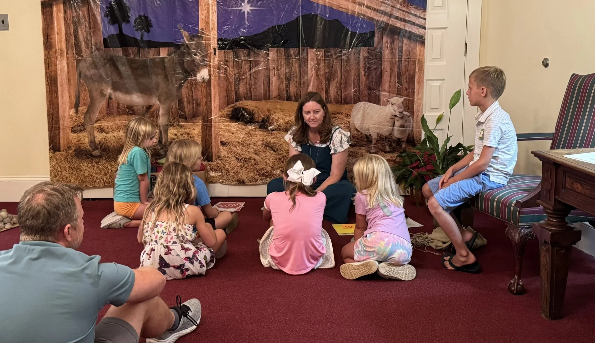 Reverend Meagan Matthews teaching children at Centenary UMC in Smithfield, NC