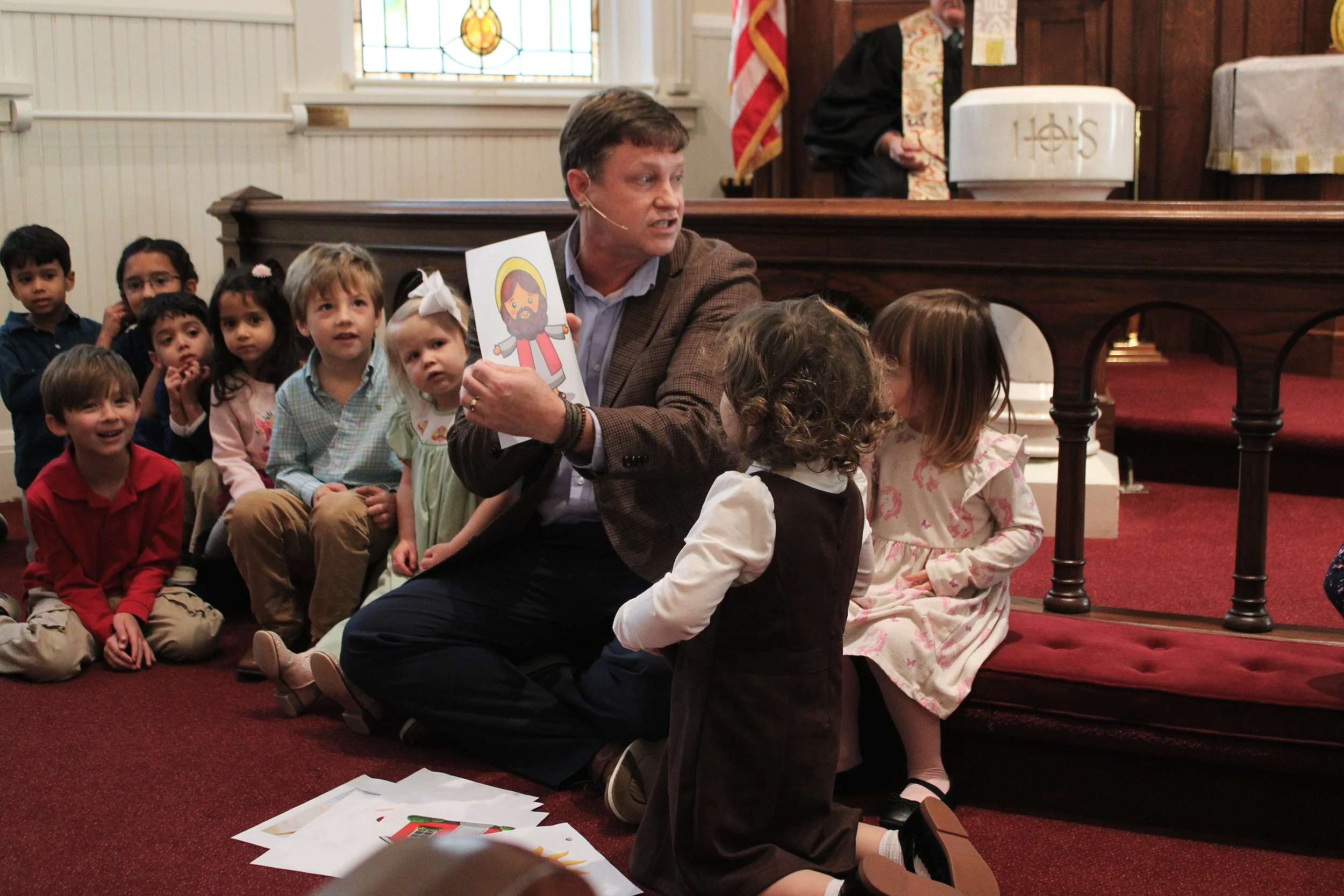 Pastor Rick Winders teaching children at Centenary UMC in Smithfield, NC