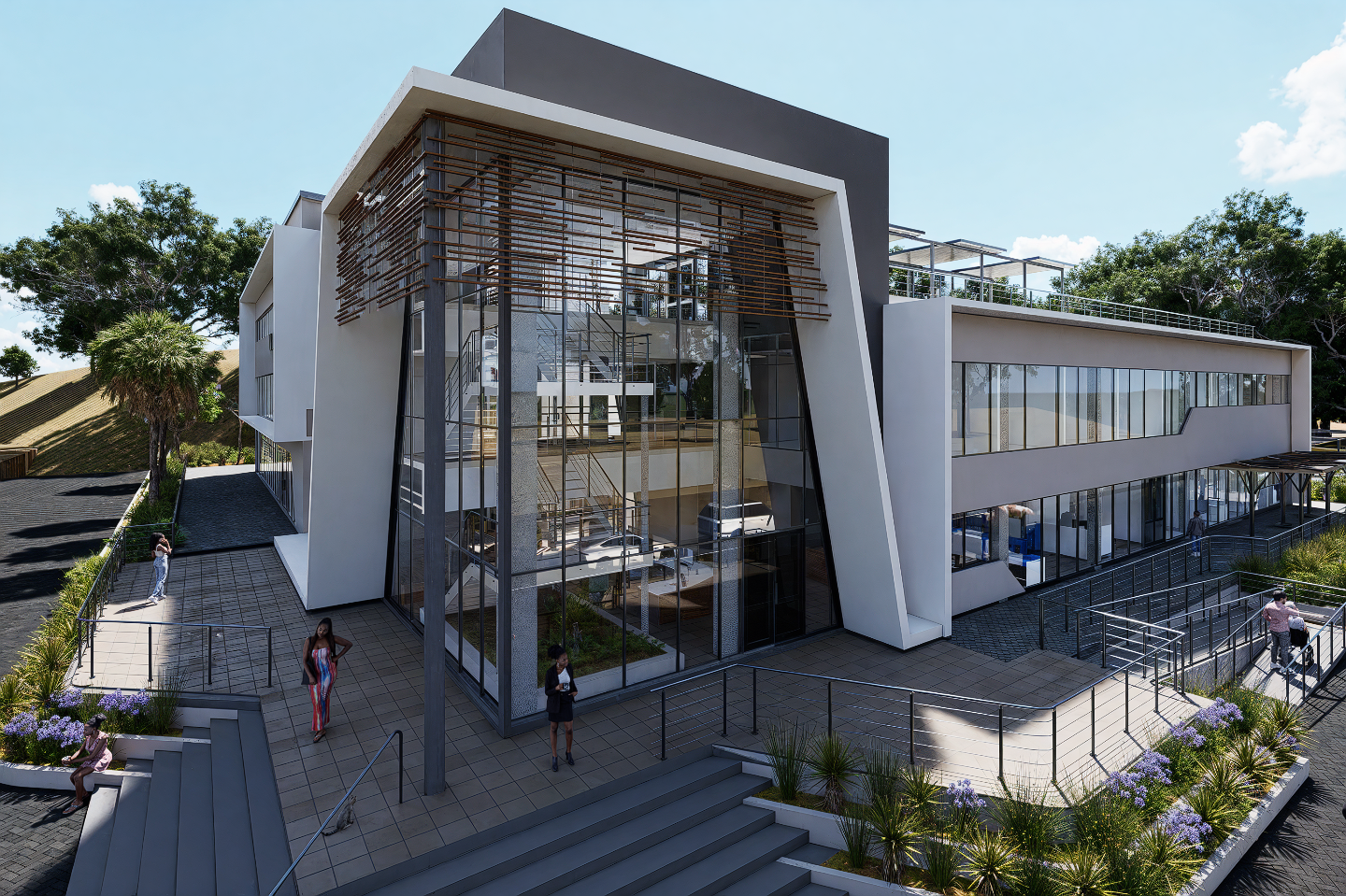 Modern multi-story building with large glass windows, white and gray exterior, and landscaping with plants and flowers. Several people are seen outside, some walking and sitting.