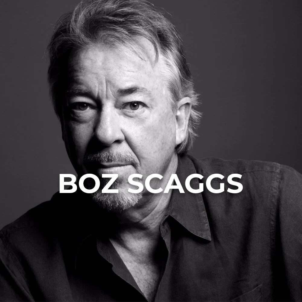 Black and white portrait of a middle-aged man with gray hair and a beard, wearing a dark shirt, with the text "BOZ SCAGGS" overlayed.