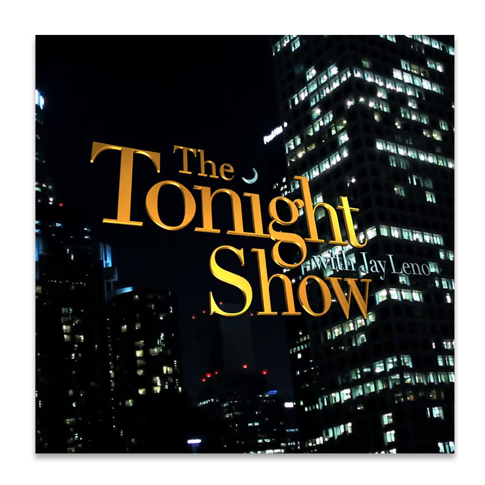 Title screen for 'The Tonight Show with Jay Leno' featuring a city skyline at night with illuminated windows in skyscrapers.