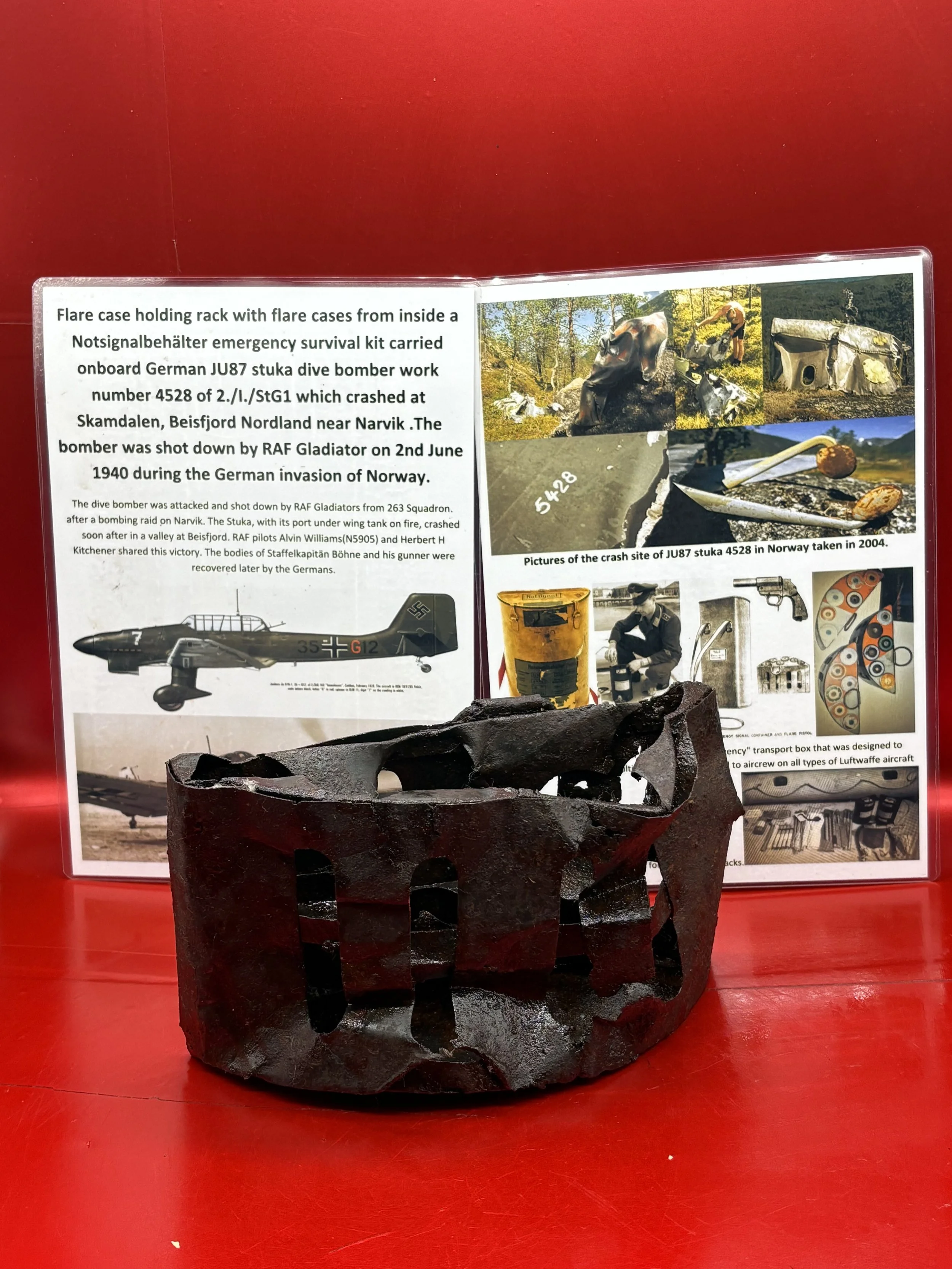 Flare case holding rack for flare cases from inside a Notsignalbehälter emergency survival kit carried onboard from German JU87 stuka dive bomber,4528 of 2./I./StG1 which was shot down in Norway 1940