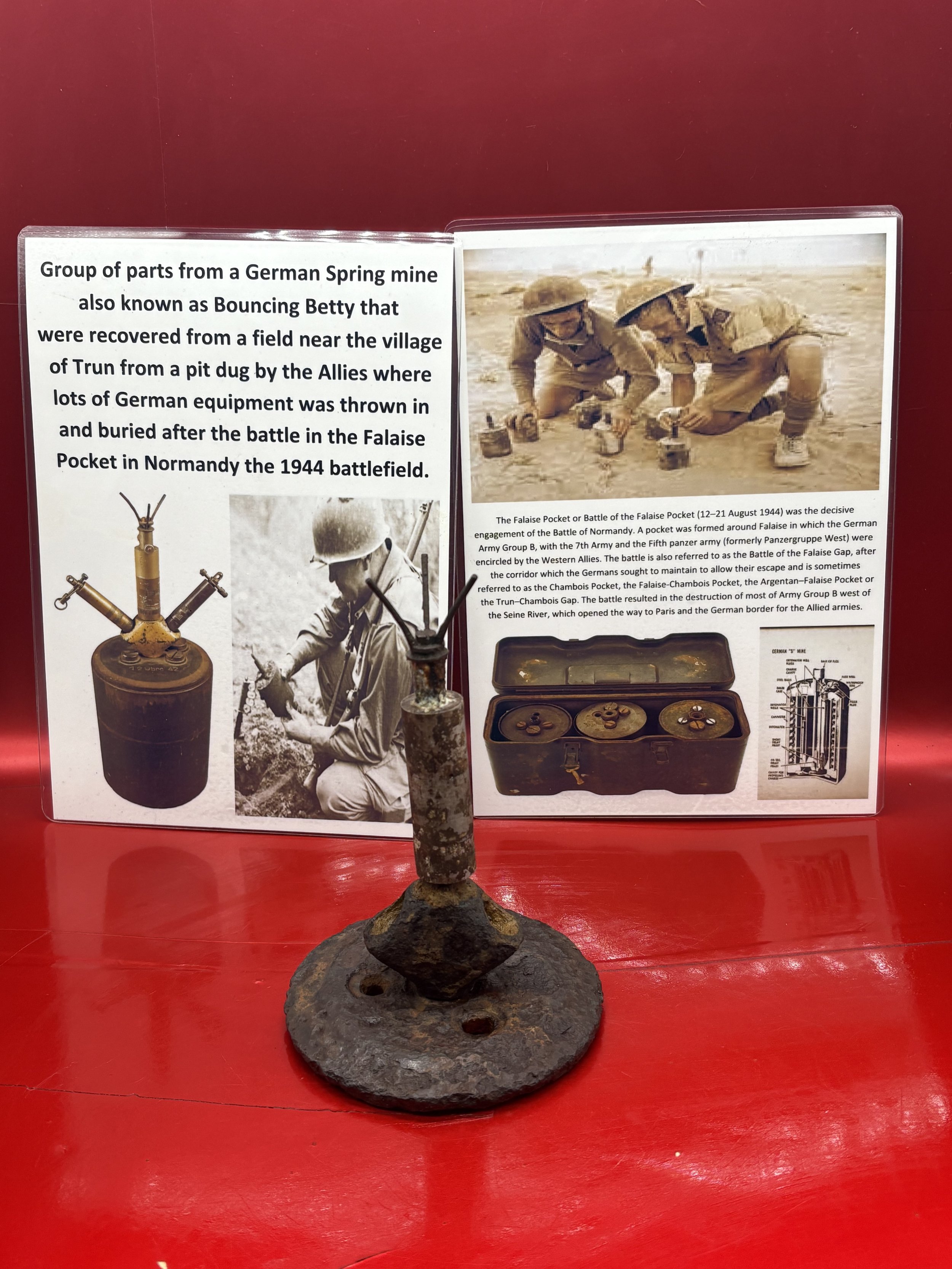 Rare group of parts from a German Spring mine also known as Bouncing Betty that were recovered from near the village of Trun in the Falaise Pocket, Normandy in 1944