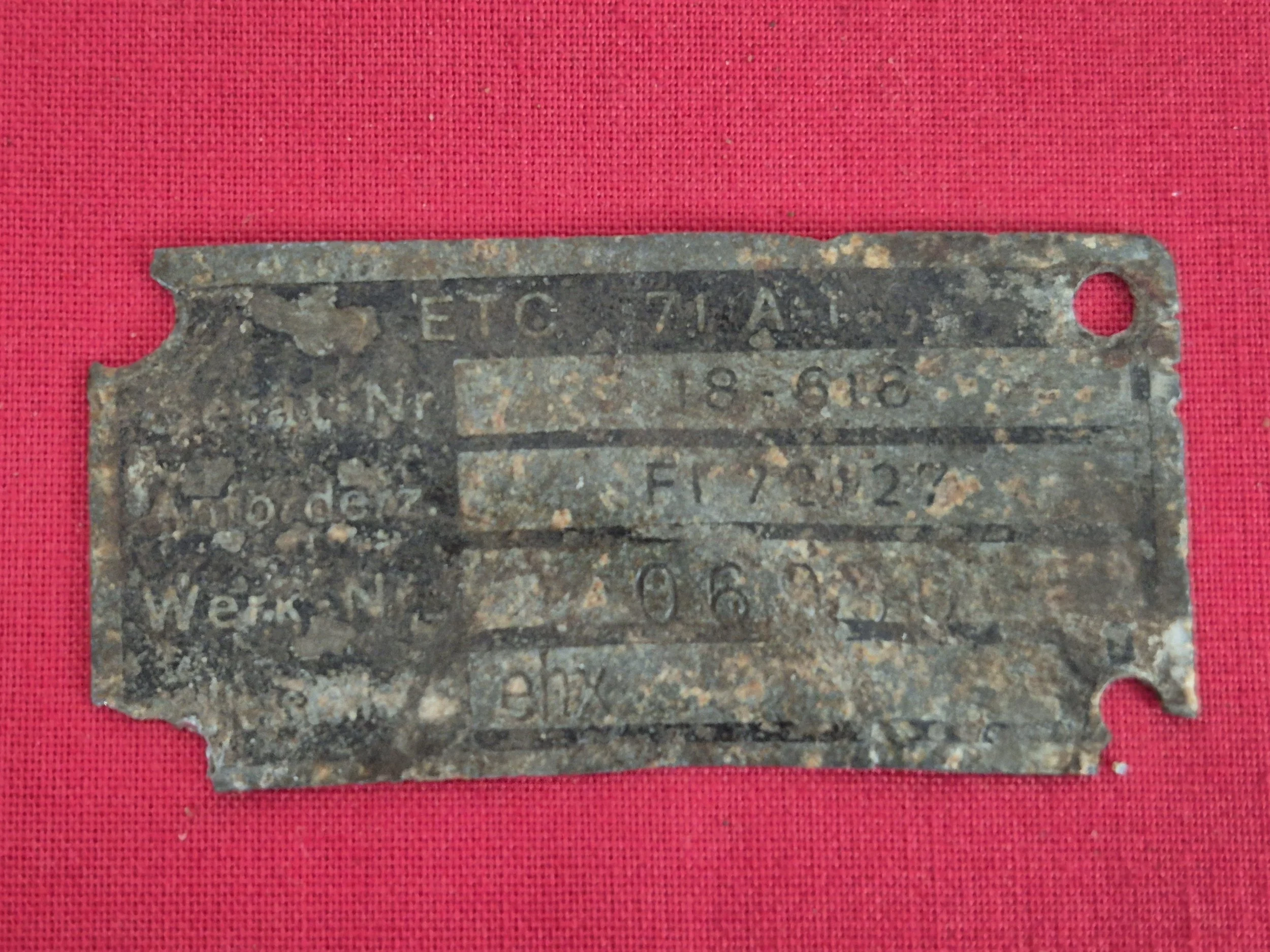 ETC 71 Bomb rack maker label from German Focke Wulf 190 ,shot down on 15th June 1944 and crashed at Rabodanges south of Falaise ,Normandy.