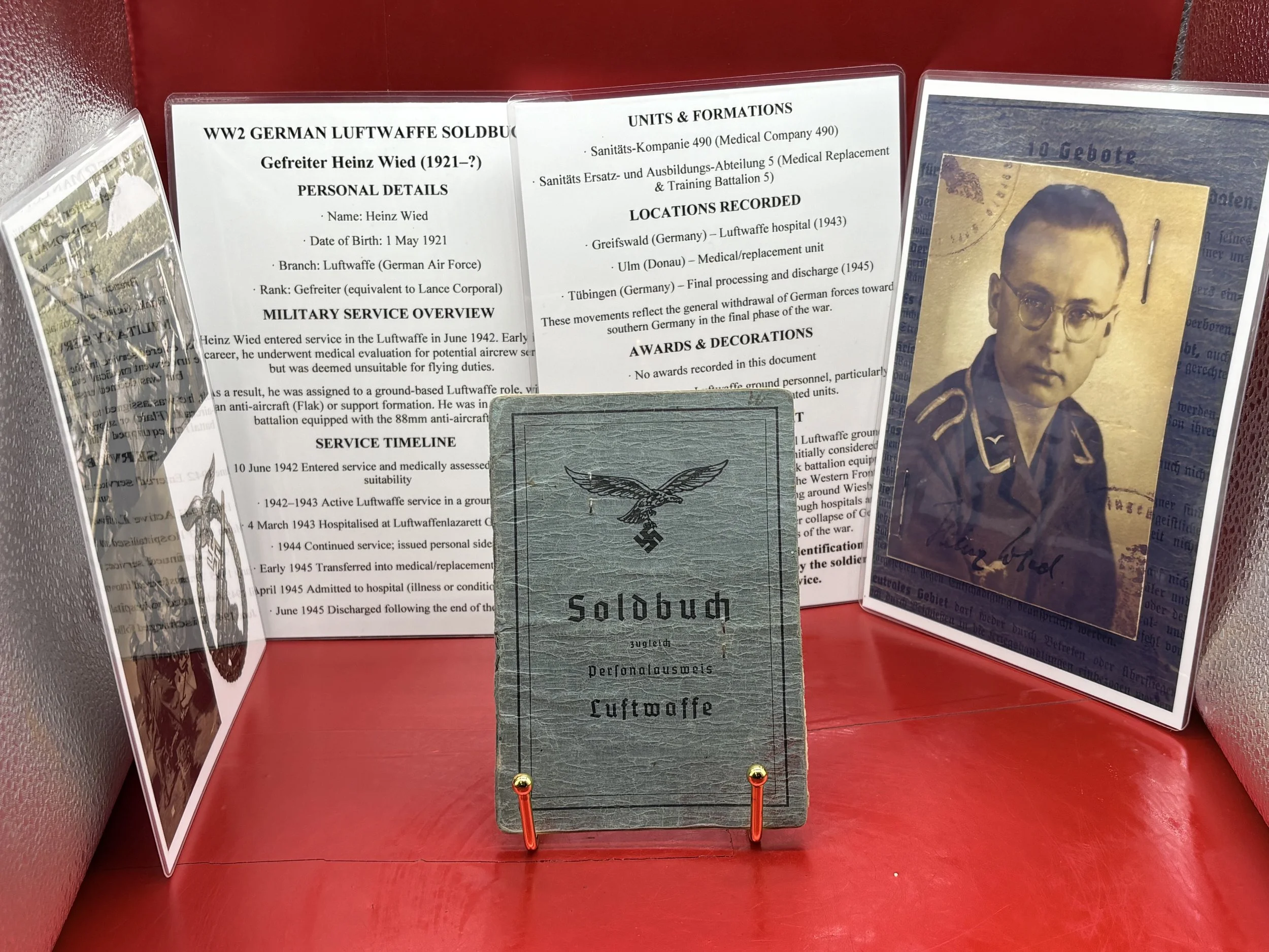 Original German Luftwaffe soldbuch for Gefreiter Heinz Wied who was a 88mm flak gunner from 1942 until the German surrender in 1945+information cards