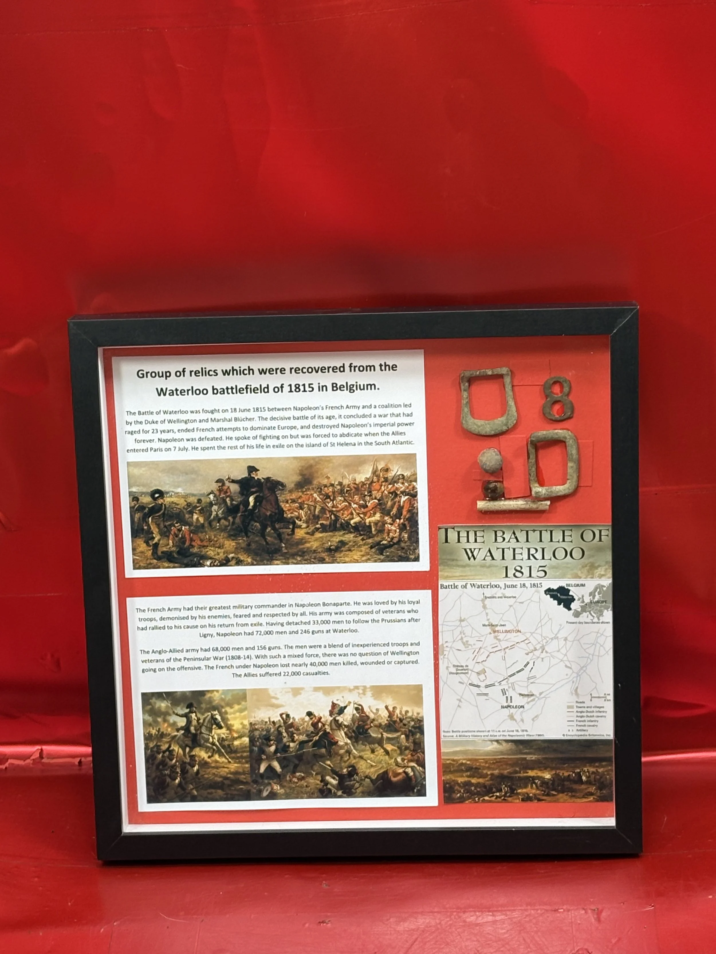 Very rare glass framed group of relics which were recovered from the Waterloo battlefield of 1815 in Belgium.