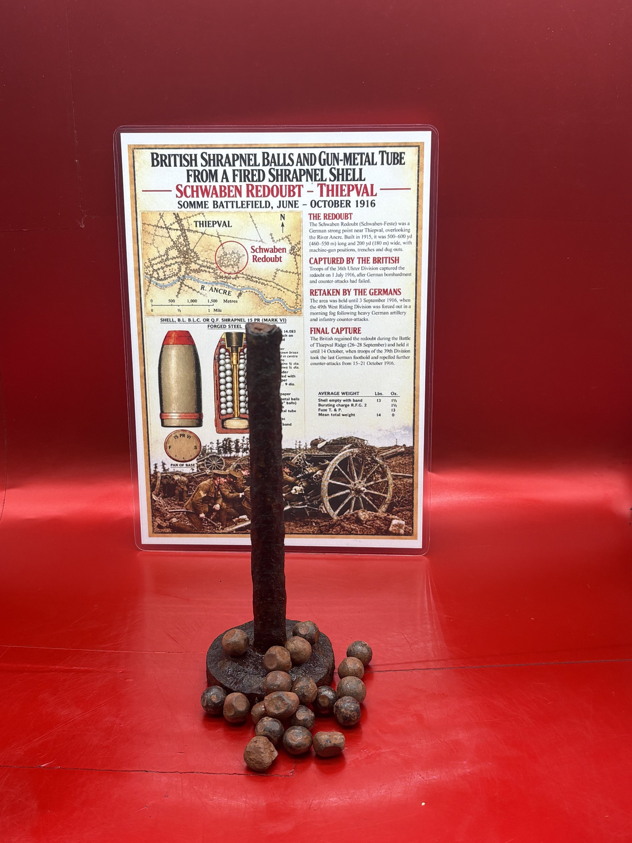British shrapnel balls and centre tube from a fired shrapnel shell that were all recovered from the area of the Schwaben Redoubt near Thiepval on the Somme Battlefield of June to October 1916.
