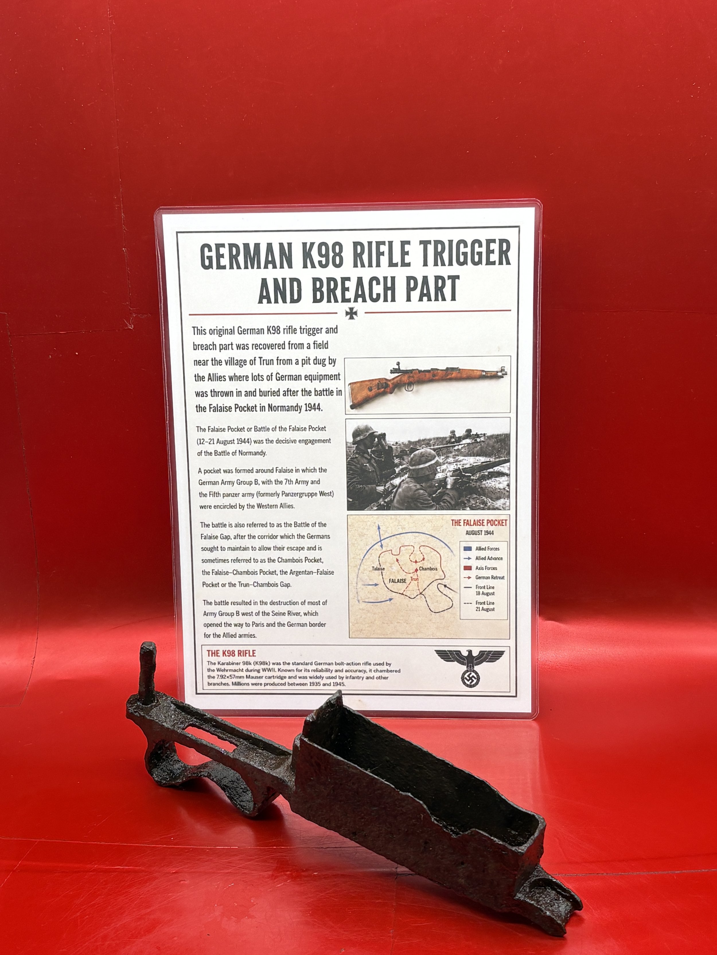 German K98 rifle trigger and bullet holder which is battle-damaged recovered from near village of Trun in the Falaise Pocket on the Normandy battlefield of 1944
