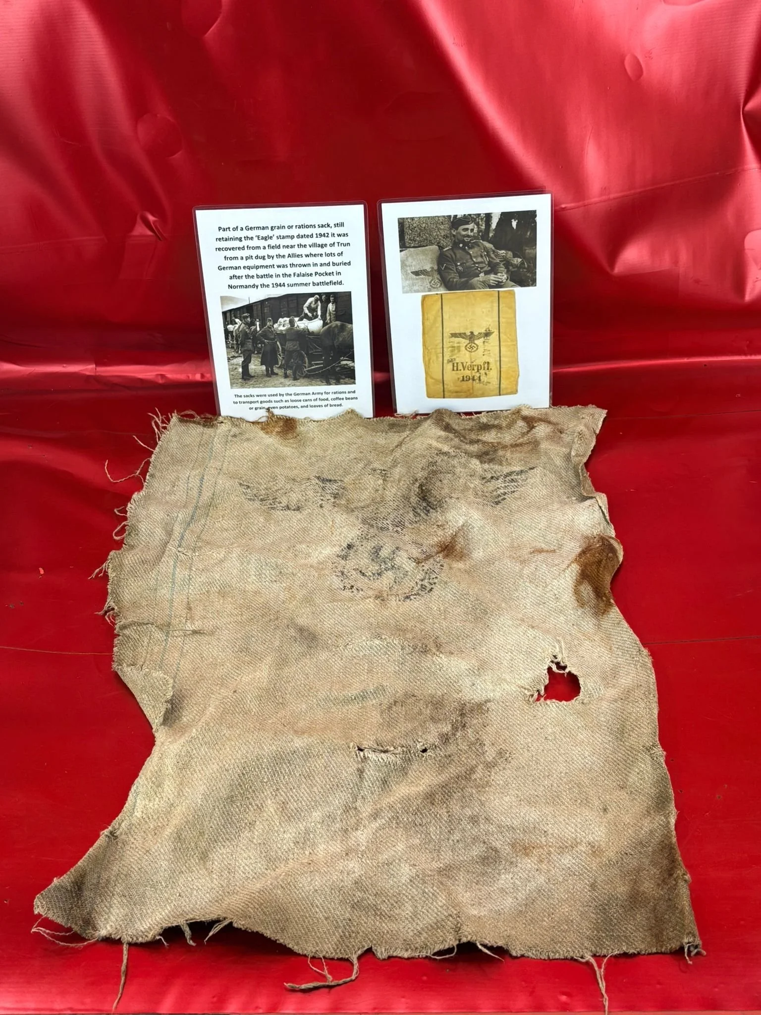 Part of a German grain or rations sack recovered from a field near Trun in the Falaise pocket in Normandy 1944