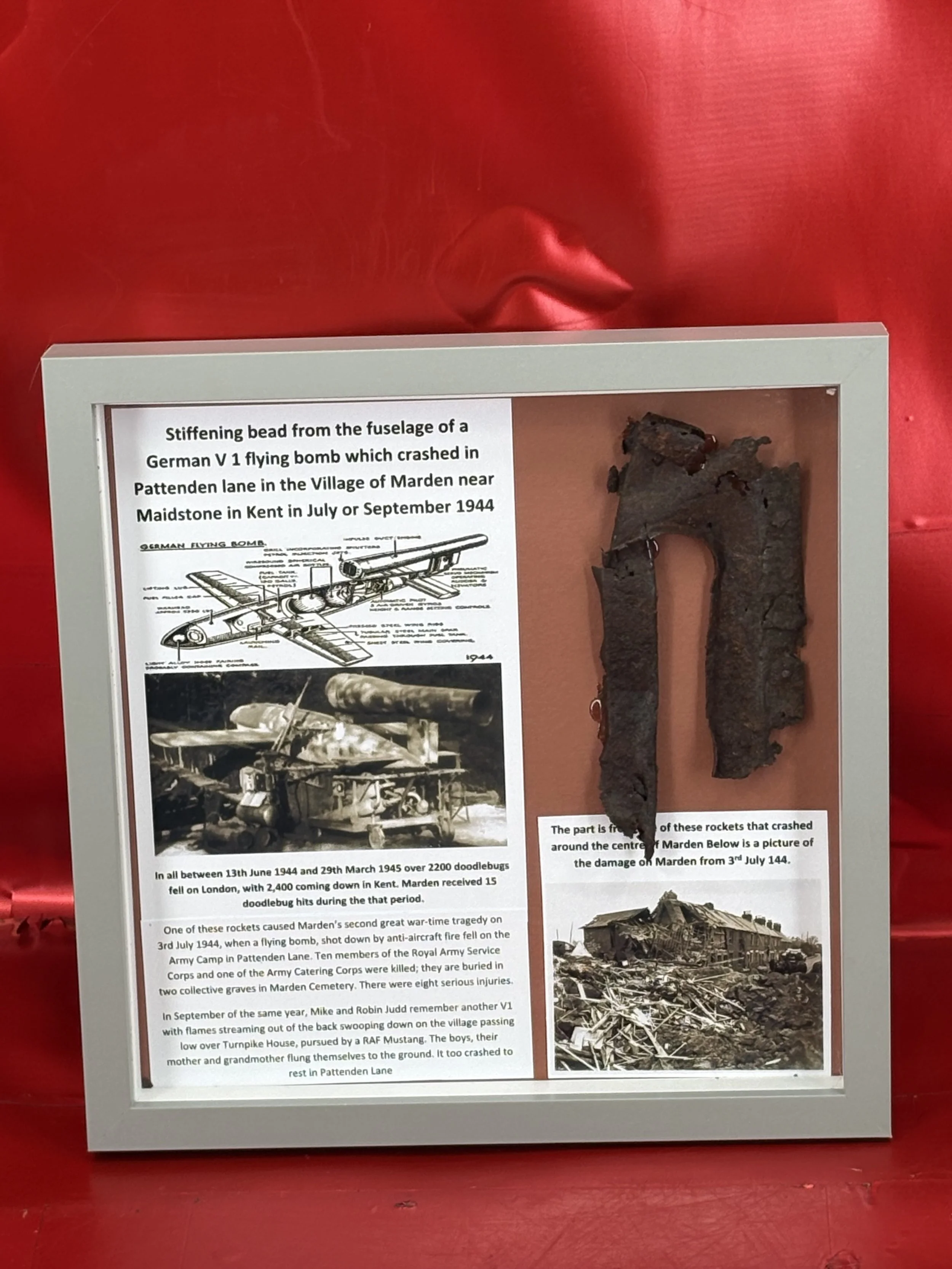 Glass framed stiffening bead from the fuselage of a German V1 flying bomb recovered near the village of Marden, close to Maidstone in Kent in 1944
