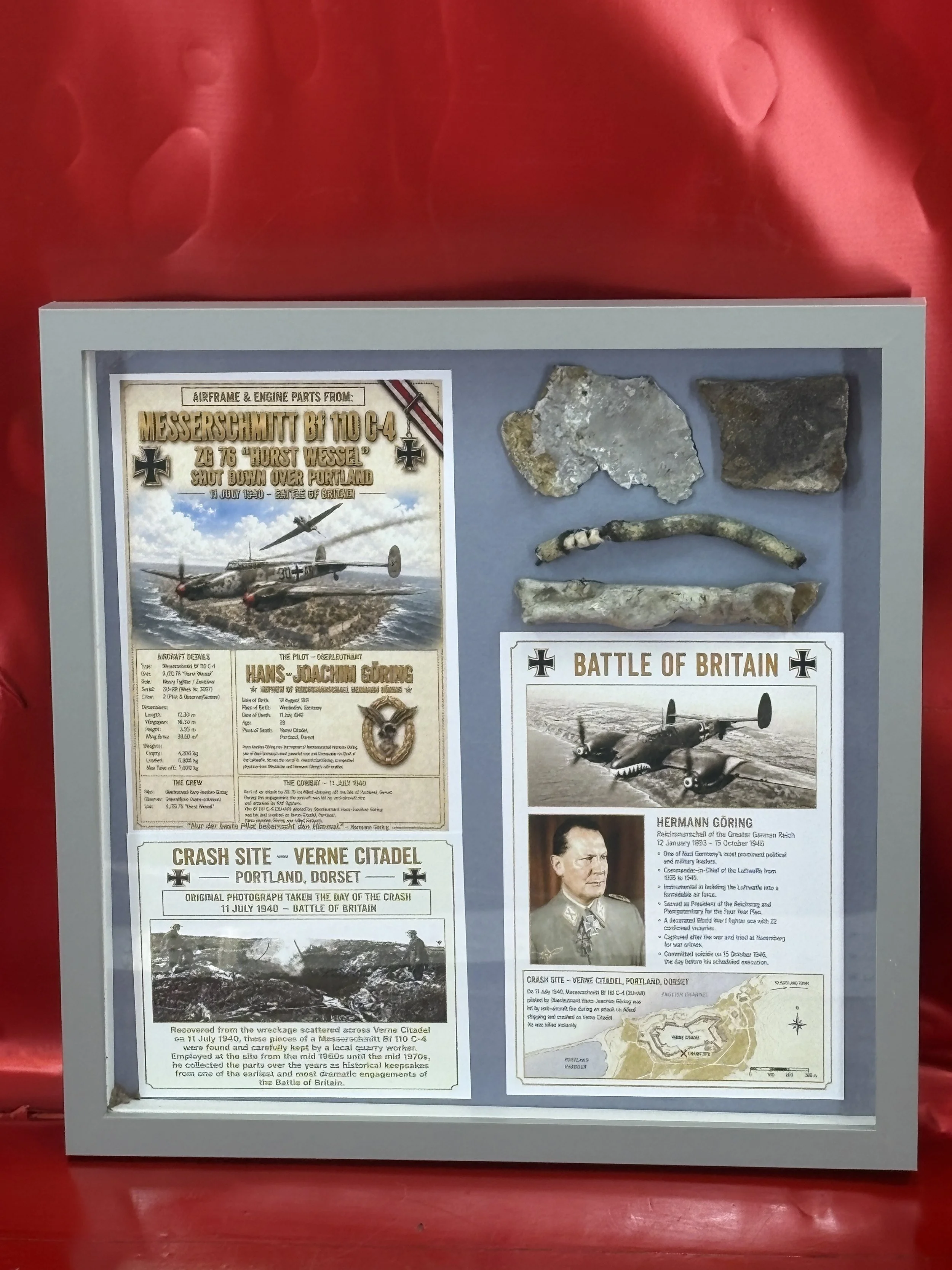 Very rare glass framed airframe and engine parts from German Messerschmitt Bf 110 of (9./ZG 76) with pilot Hans Joachim Goring [Nephew} of Hermann, shot down 11th July 1940 in Battle of Britain