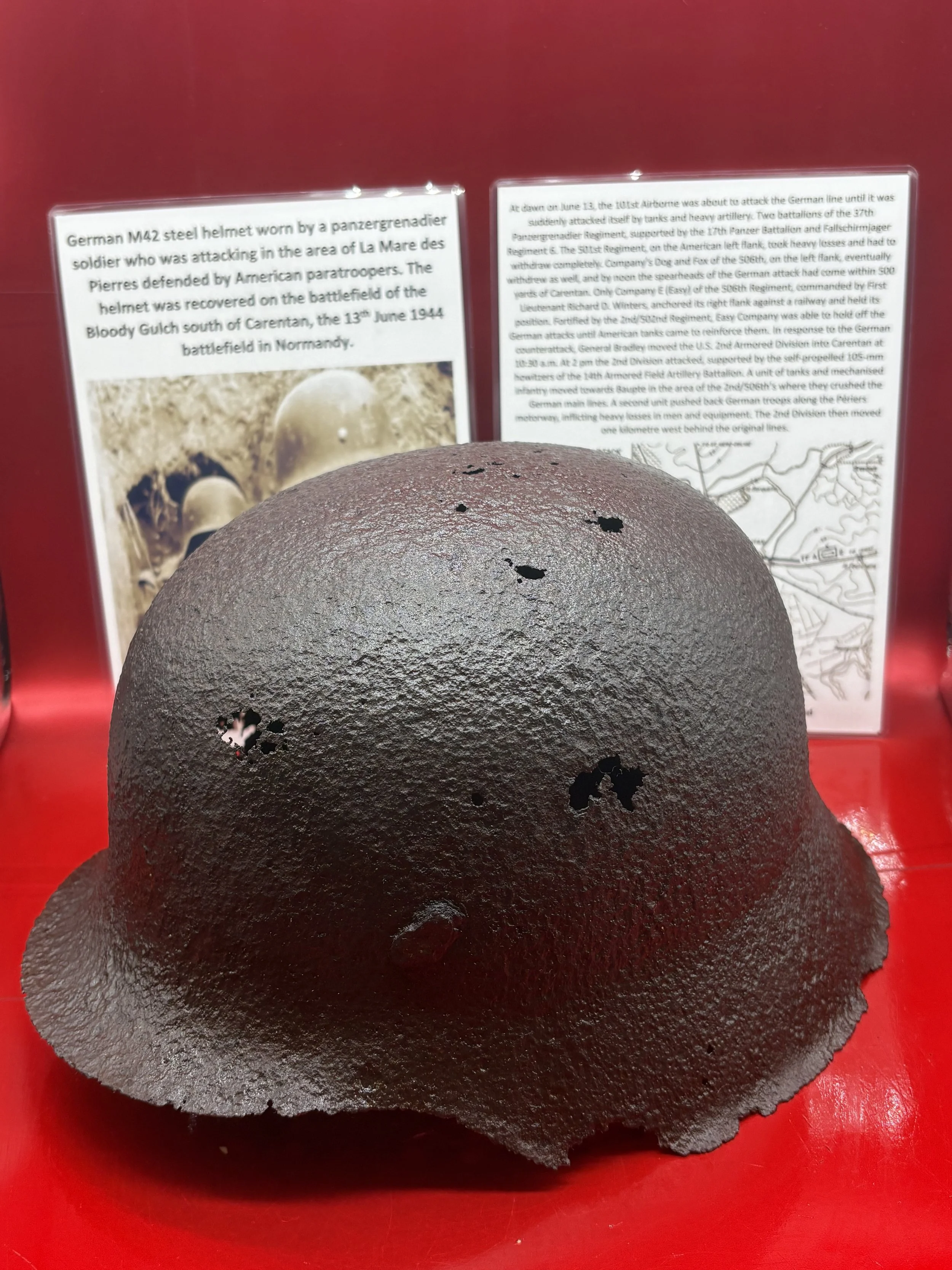 German soldiers solid relic M42 steel helmet,re used for somthing recovered from the La Mare des Pierres area during the Battle of the Bloody Gulch south of Carentan on 13 June 1944