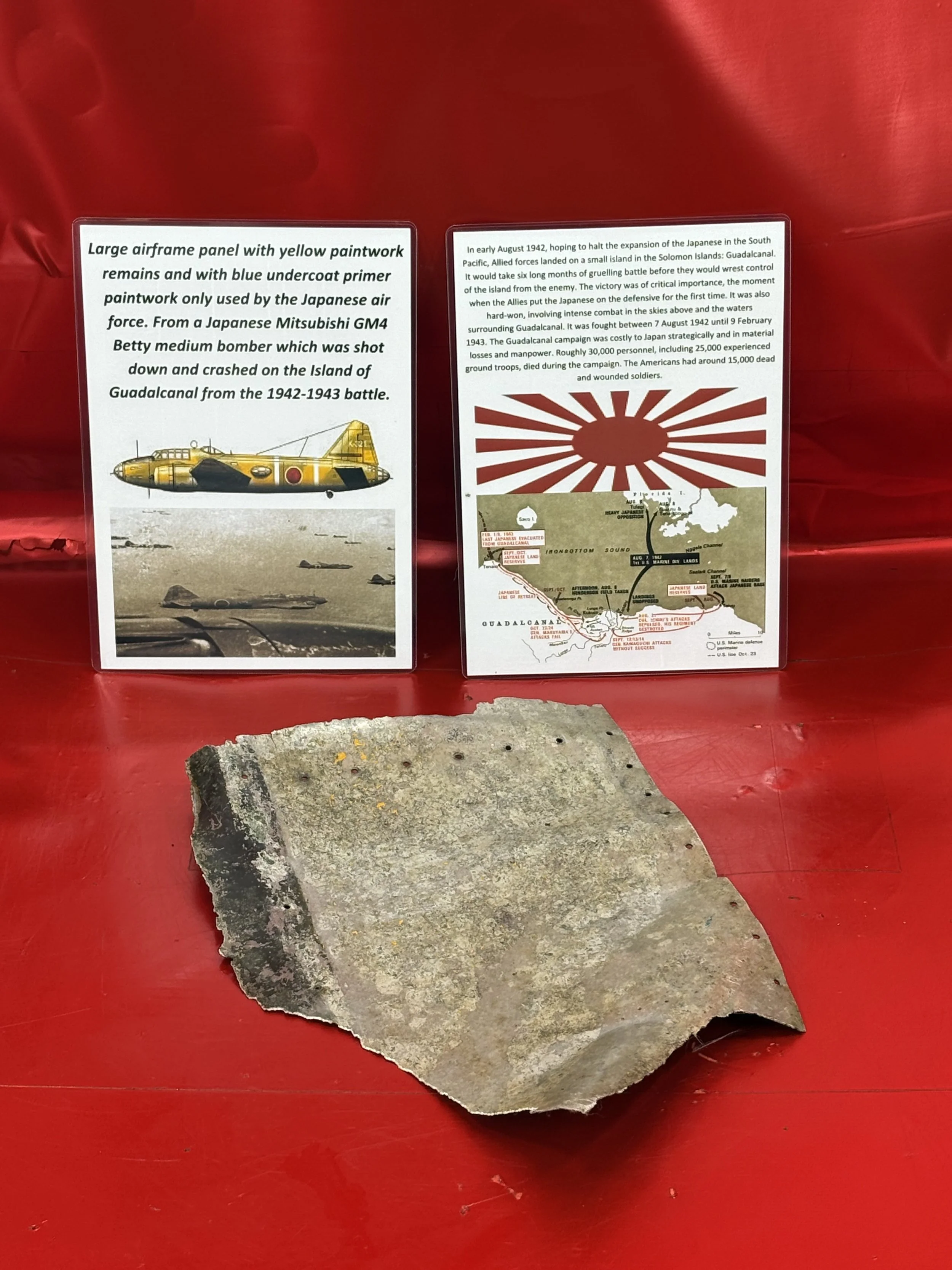 Very rare large airframe panel from Japanese Mitsubishi Betty bomber, yellow paintwork,blue undercoat primer only used by Japanese airforce recovered from Island of Guadlcanal, 1942-1943 battlefield
