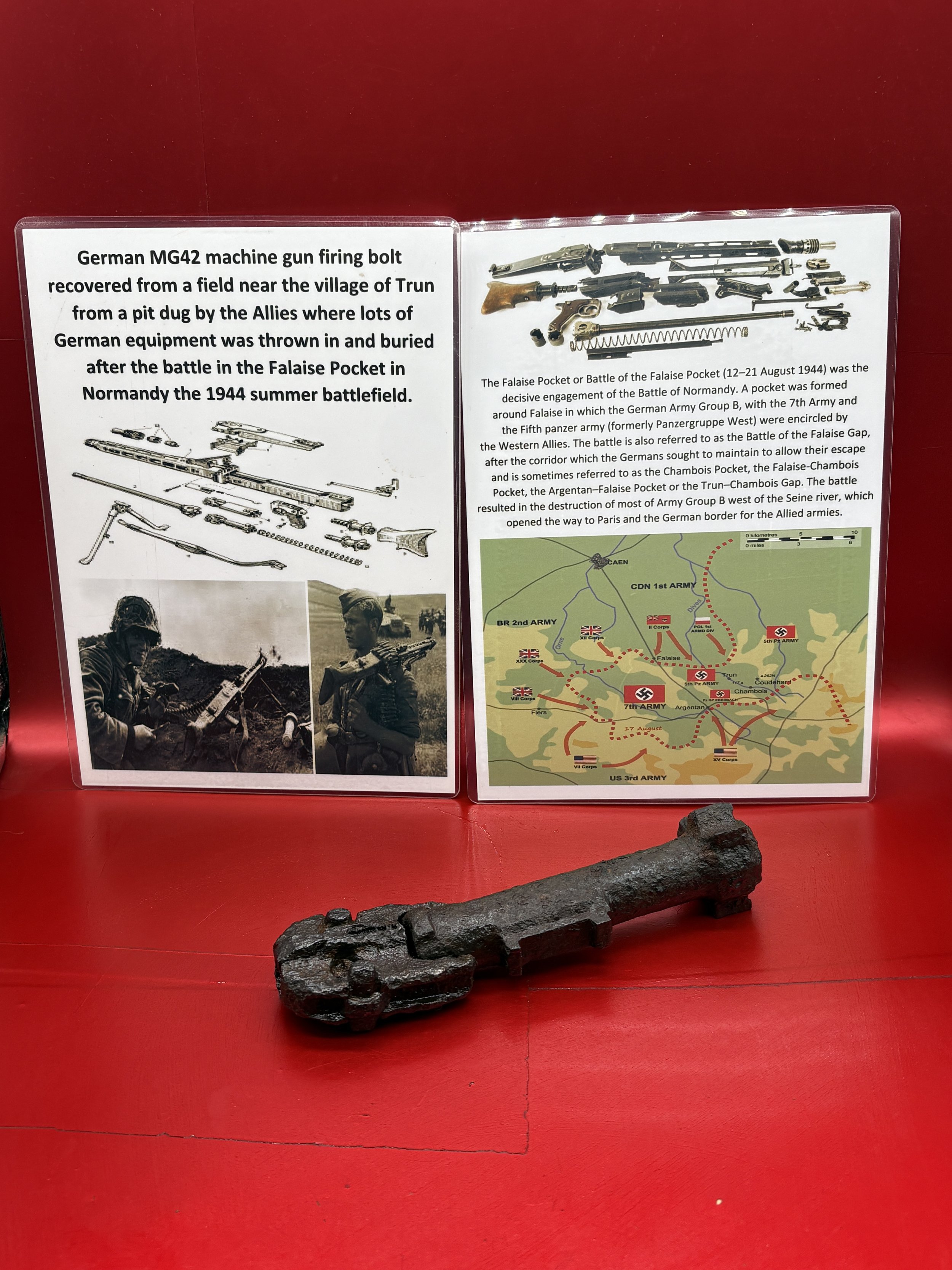 German MG 42 machine gun firing bolt nice solid relic condition that was recovered from a field near Trun in the Falaise pocket in Normandy 1944 battlefield.