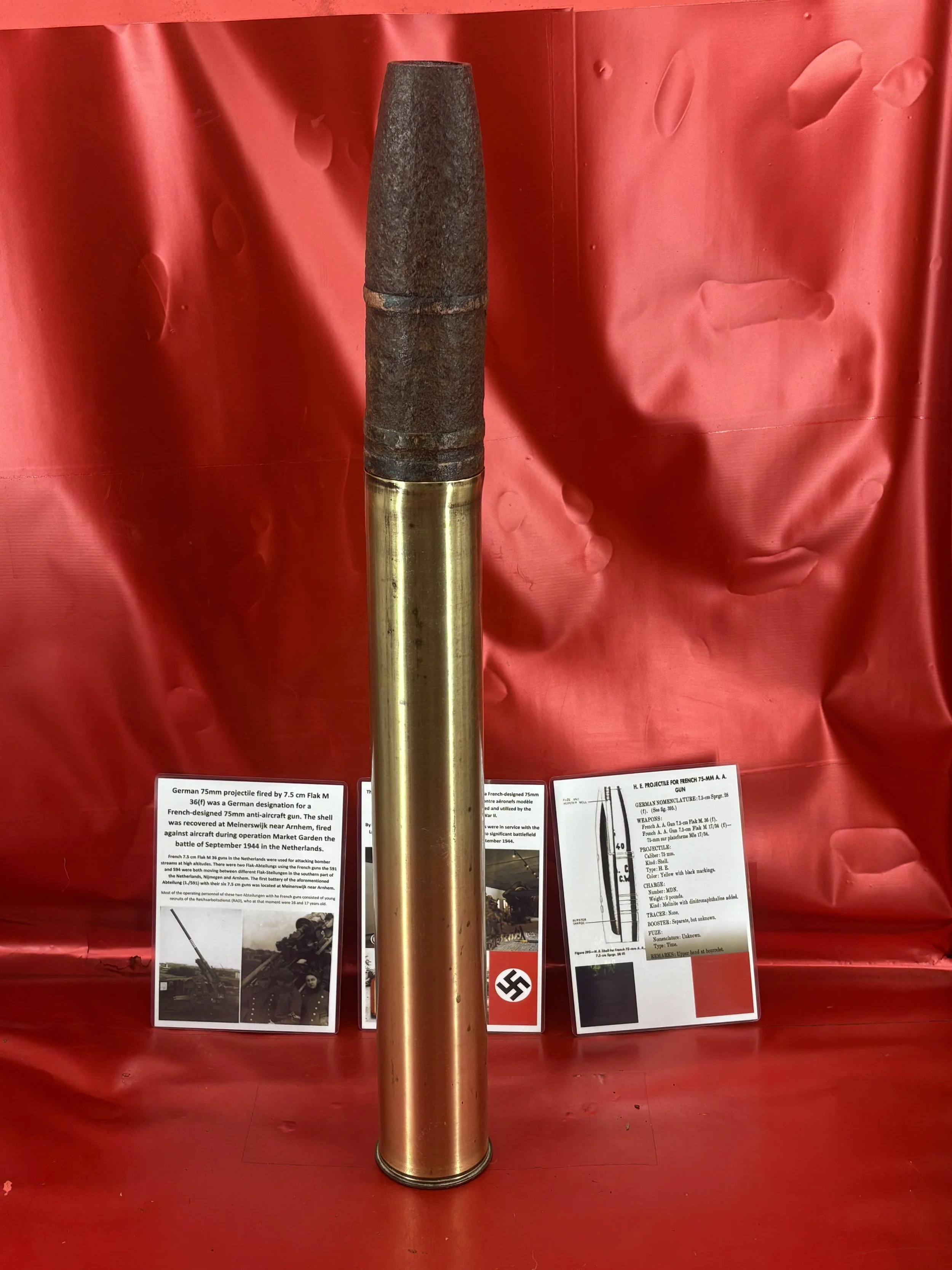 Very rare 75mm projectile and shell case fired by 7.5 cm Flak M 36(f), German designation for a French-designed 75mm anti-aircraft gun,the projectile was recovered at Meinerswijk near Arnhem,Holland