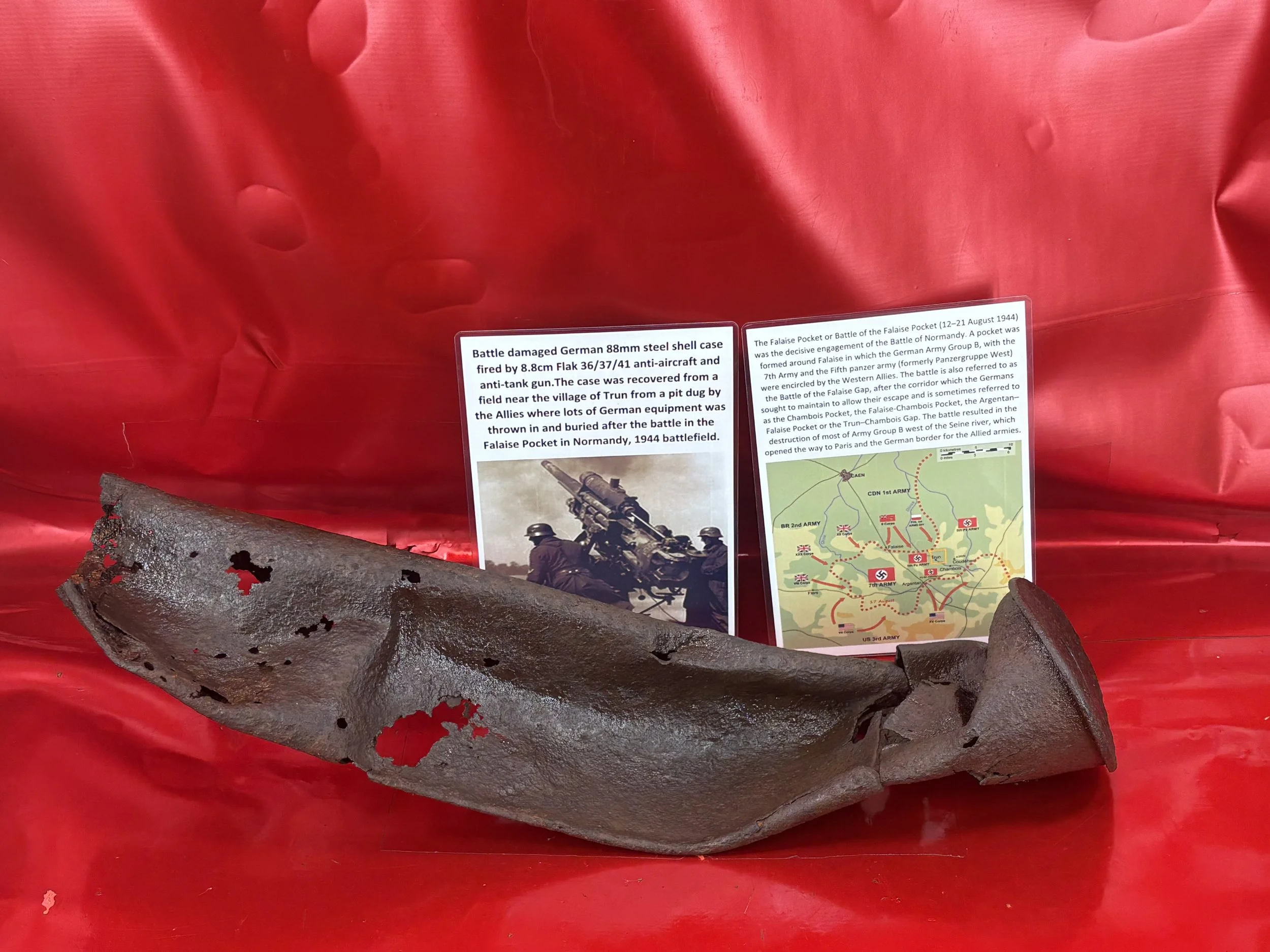 Battledamaged 88mm steel shell case for German flak 36/37/41 anti-aircraft gun with no markings on the base it was recovered near Trun in Falaise Pocket, Normandy 1944