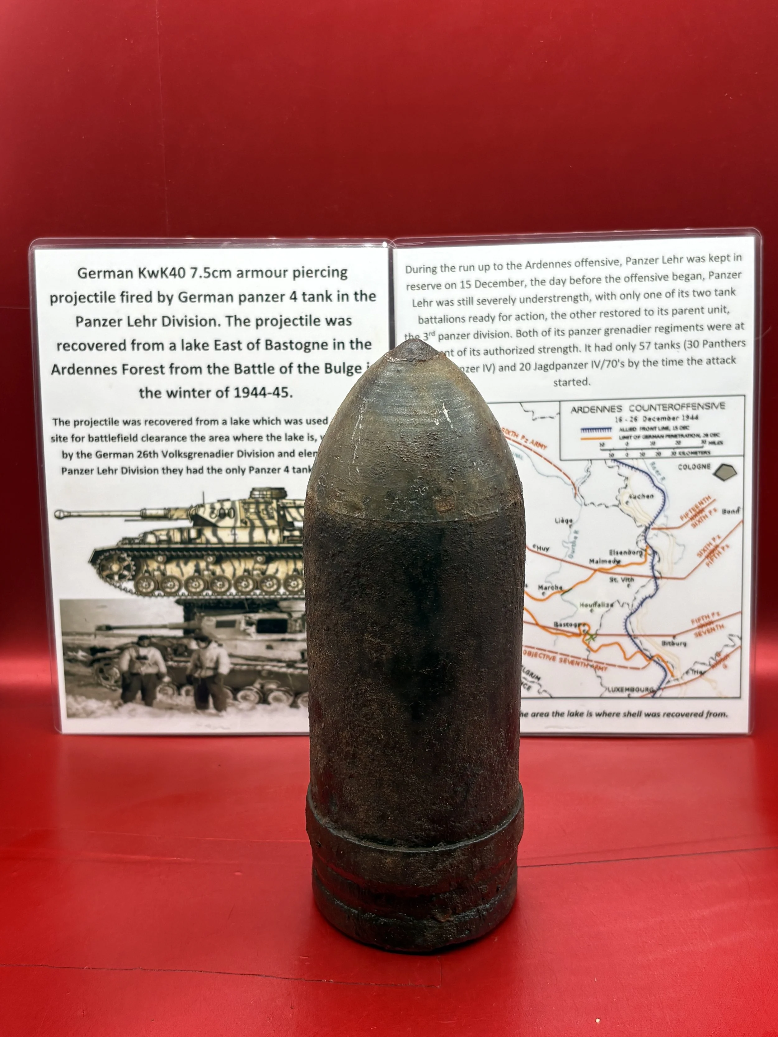 German KwK40 7.5cm armour piercing projectile,complete driving band fired by German panzer 4 tank, it was recovered from a lake East of Bastogne in the Ardennes Forest 1944-1945
