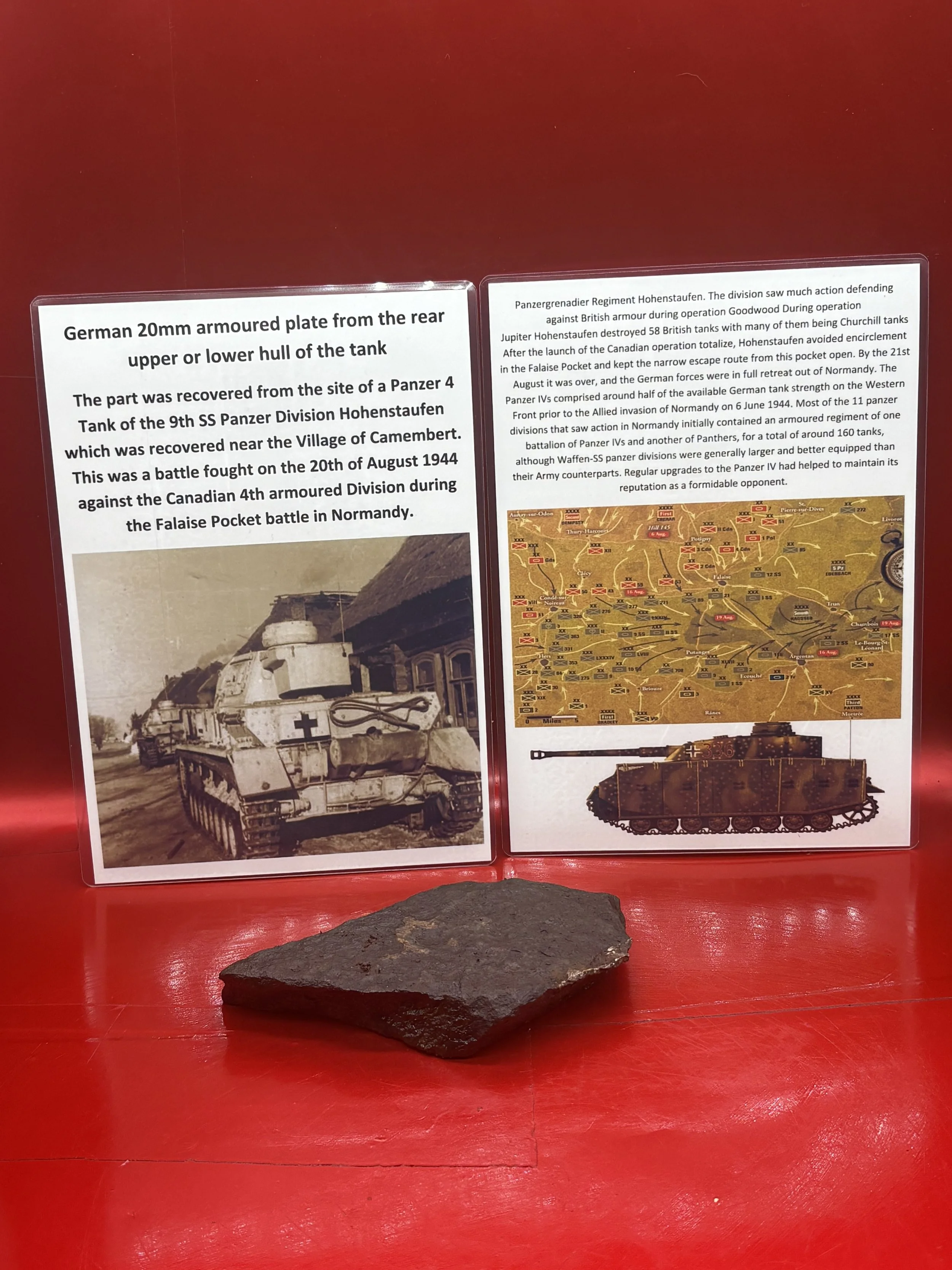 Blown section of 20mm armour plate from upper or lower rear armour with brown camouflage paintwork remains on a German panzer 4 tank recovered near the Village of Camembert in Normandy 1944