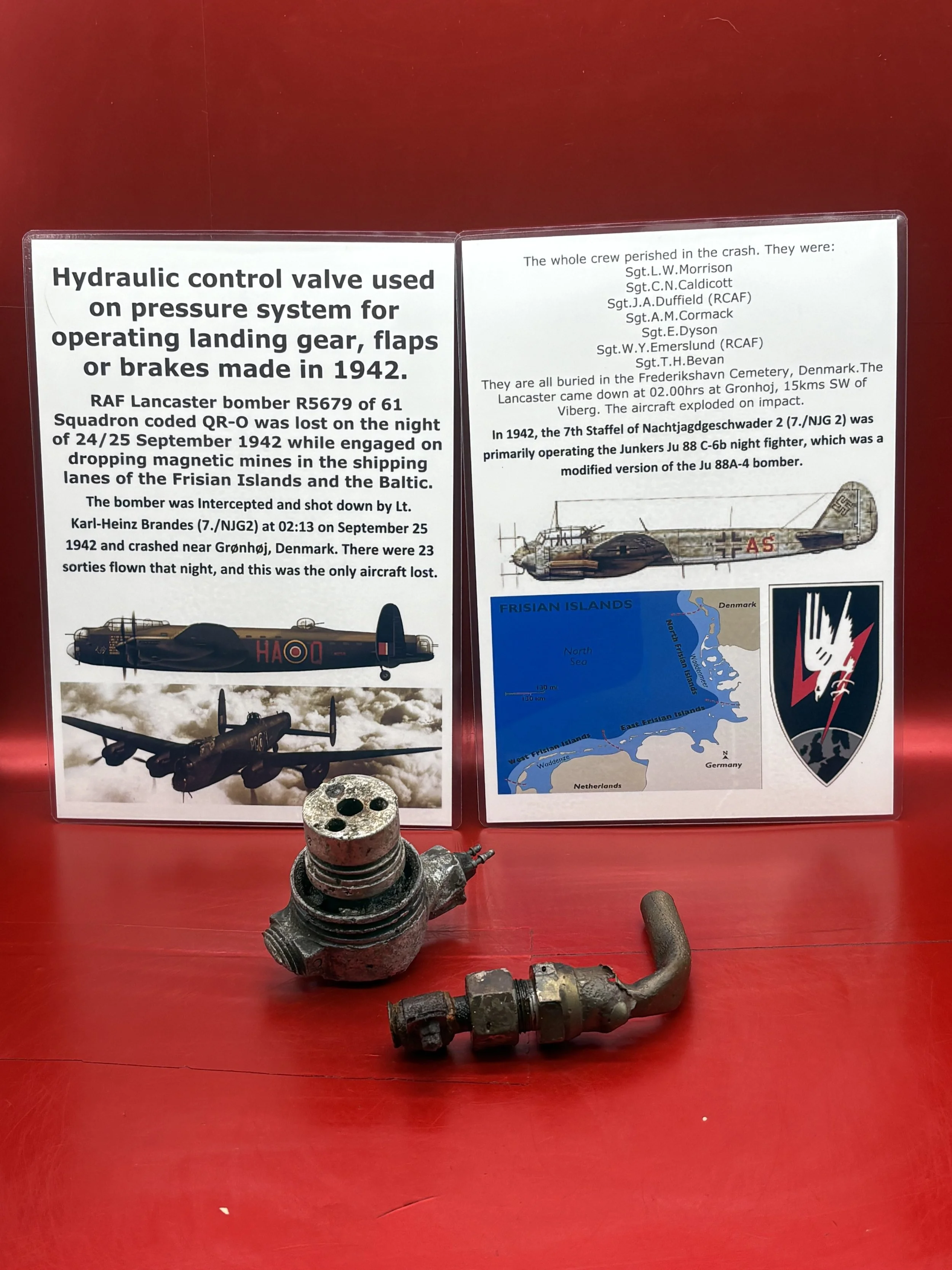 Electrical connector and a manual control lever from cockpit of RAF Lancaster bomber R5679 of 61 Squadron shot down,night of 24/25 September 1942 by German night fighter in Denmark