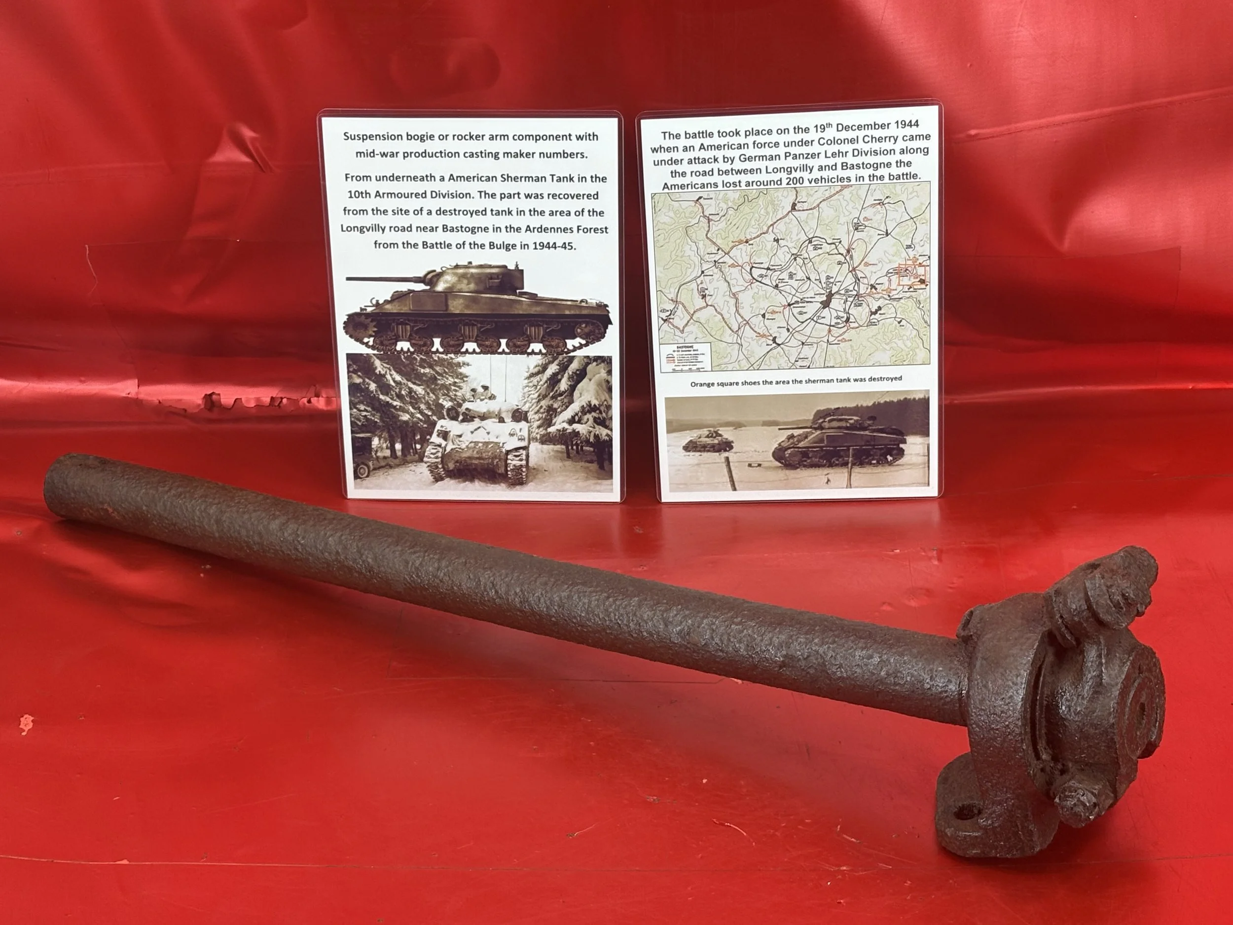 Suspension bogie or rocker arm component from underneath American Sherman of 10th armoured Division from the site of destroyed tank recovered, Longvilly road Ardennes Forest 1944