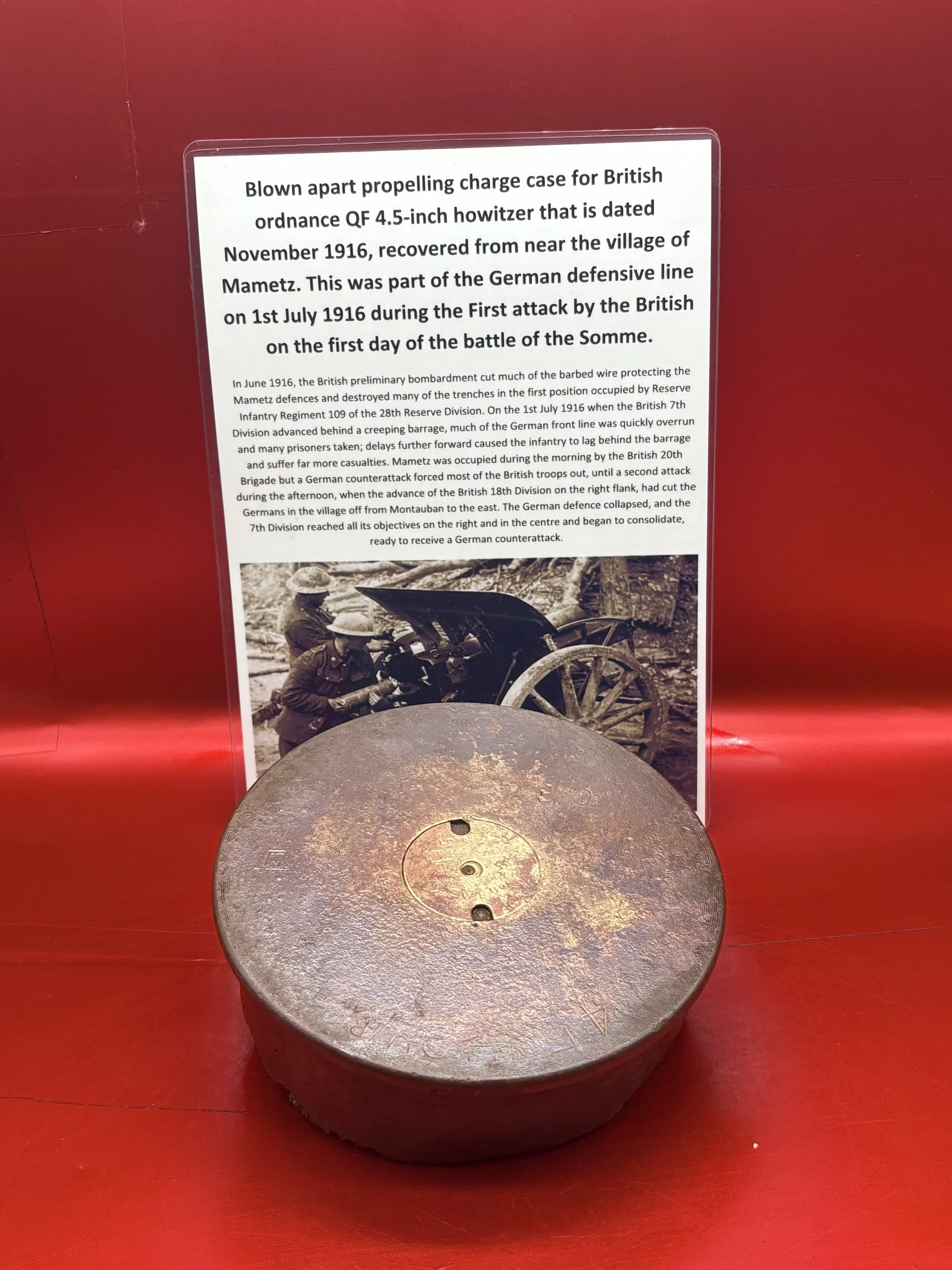 Blown apart propelling charge case for British ordnance QF 4.5-inch howitzer that is dated November 1915, recovered at Mametz part of the German defensive line on 1st July 1916 Somme battlefield