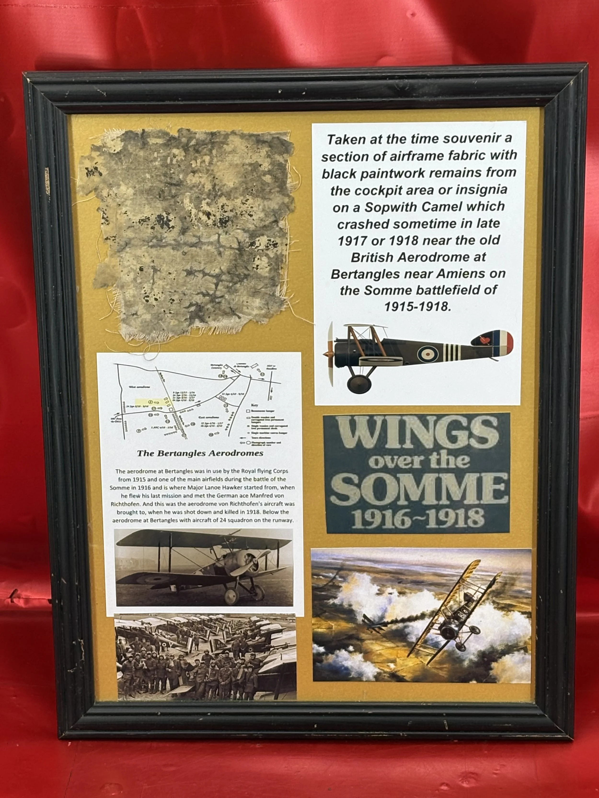 Large glass framed Totally rare taken at the time souvenir.section of airframe fabric with lots of black paintwork remains from the cockpit area/insignia on a Sopwith Camel,crashed-Somme battlefield
